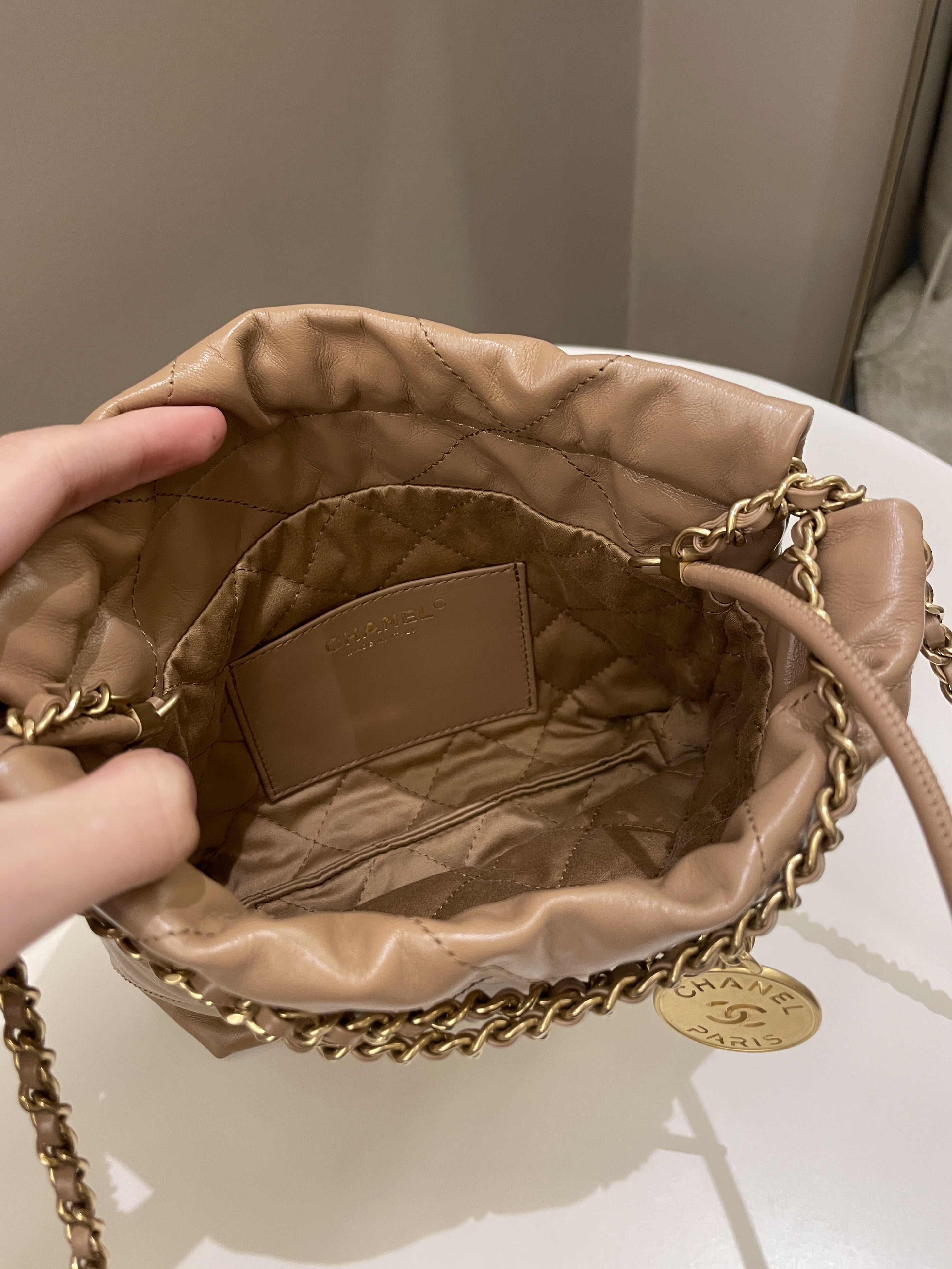 Chanel 23B 22 Mini Hobo Beige Calfskin