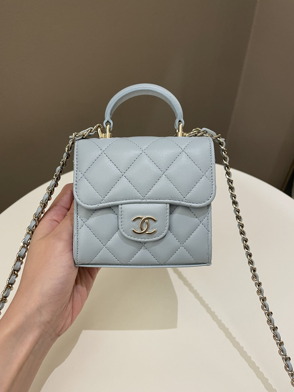 Chanel 22P Top Handle Clutch On Chain Baby Blue Lambskin
