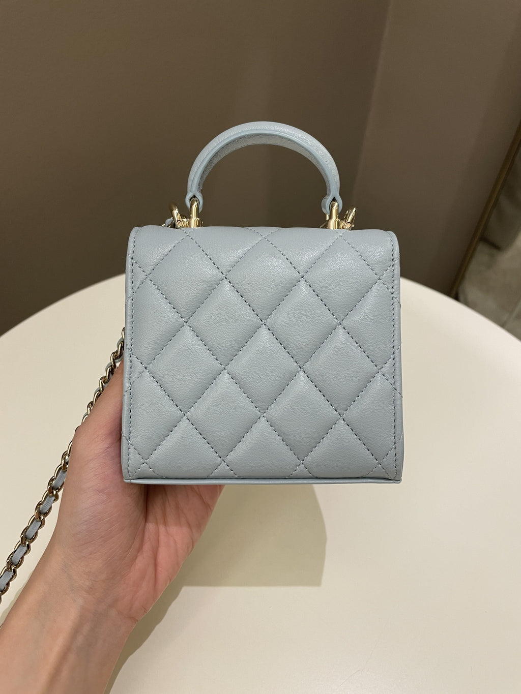 Chanel 22P Top Handle Clutch On Chain Baby Blue Lambskin