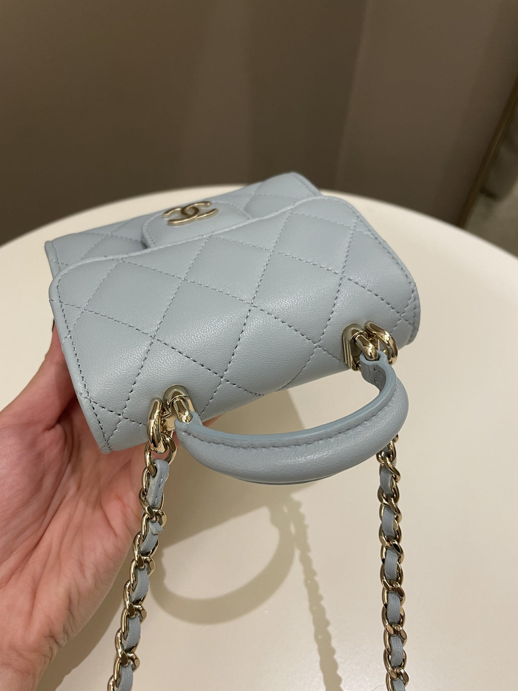Chanel 22P Top Handle Clutch On Chain Baby Blue Lambskin