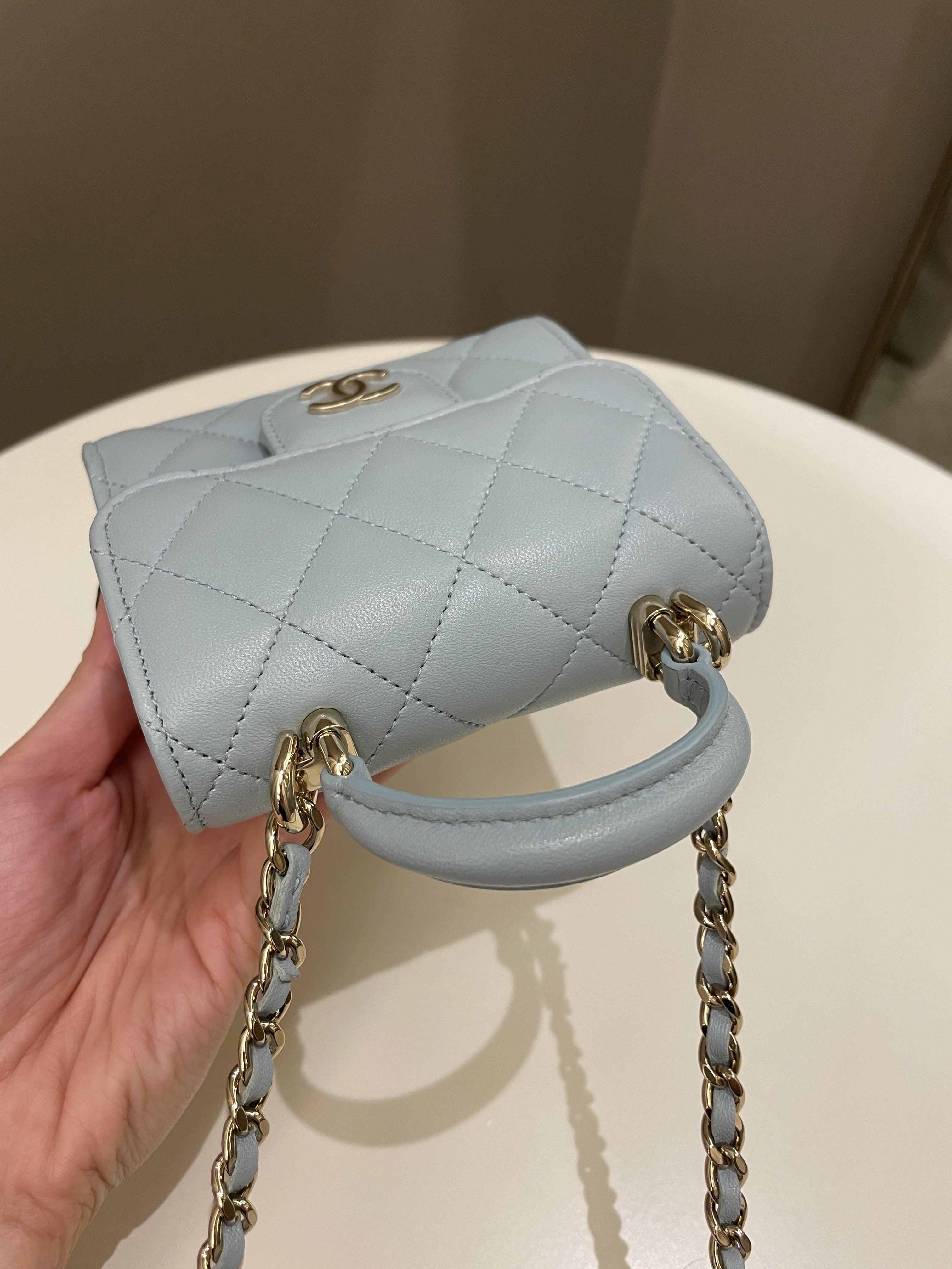 Chanel 22P Top Handle Clutch On Chain Baby Blue Lambskin