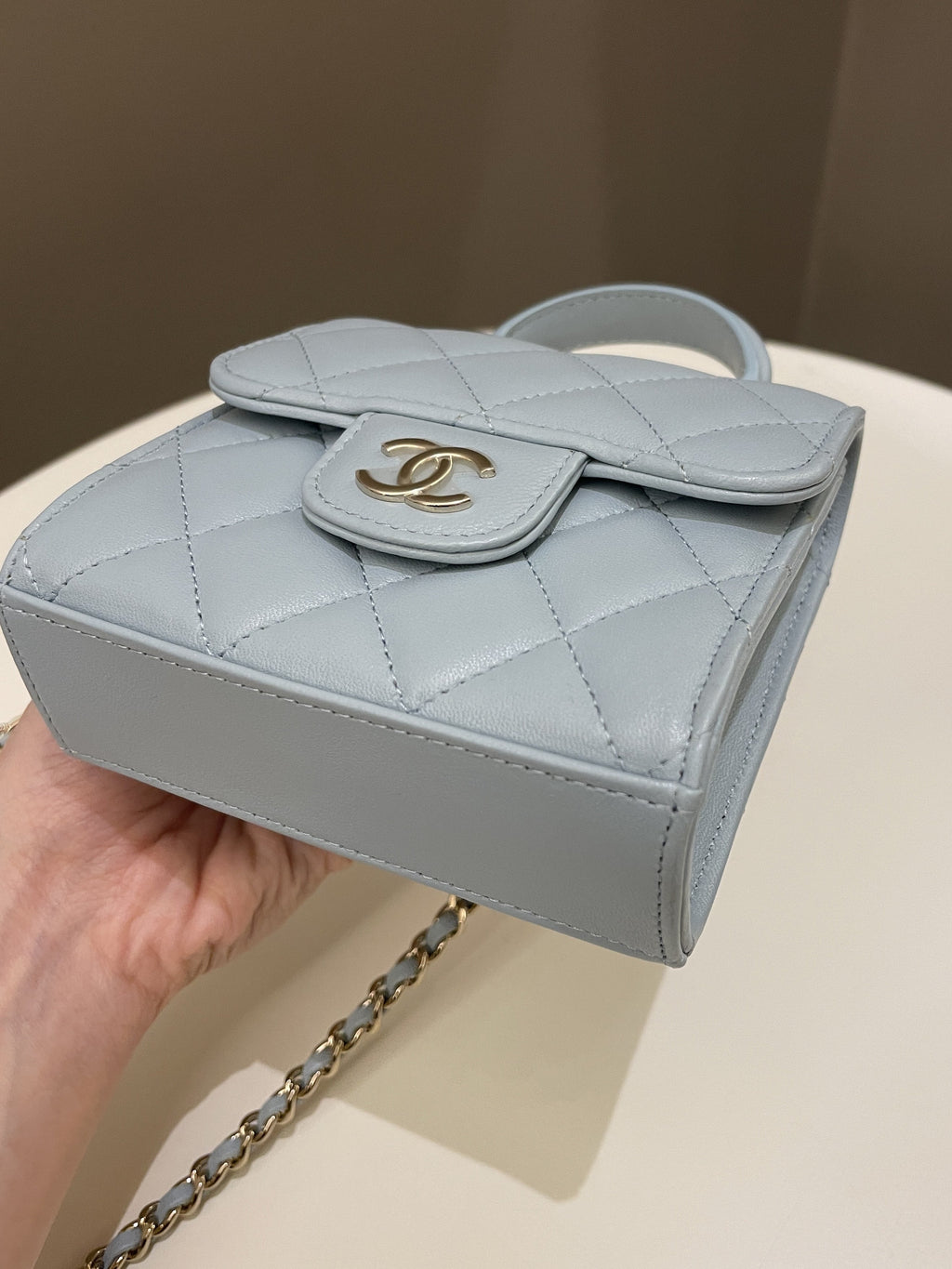 Chanel 22P Top Handle Clutch On Chain Baby Blue Lambskin