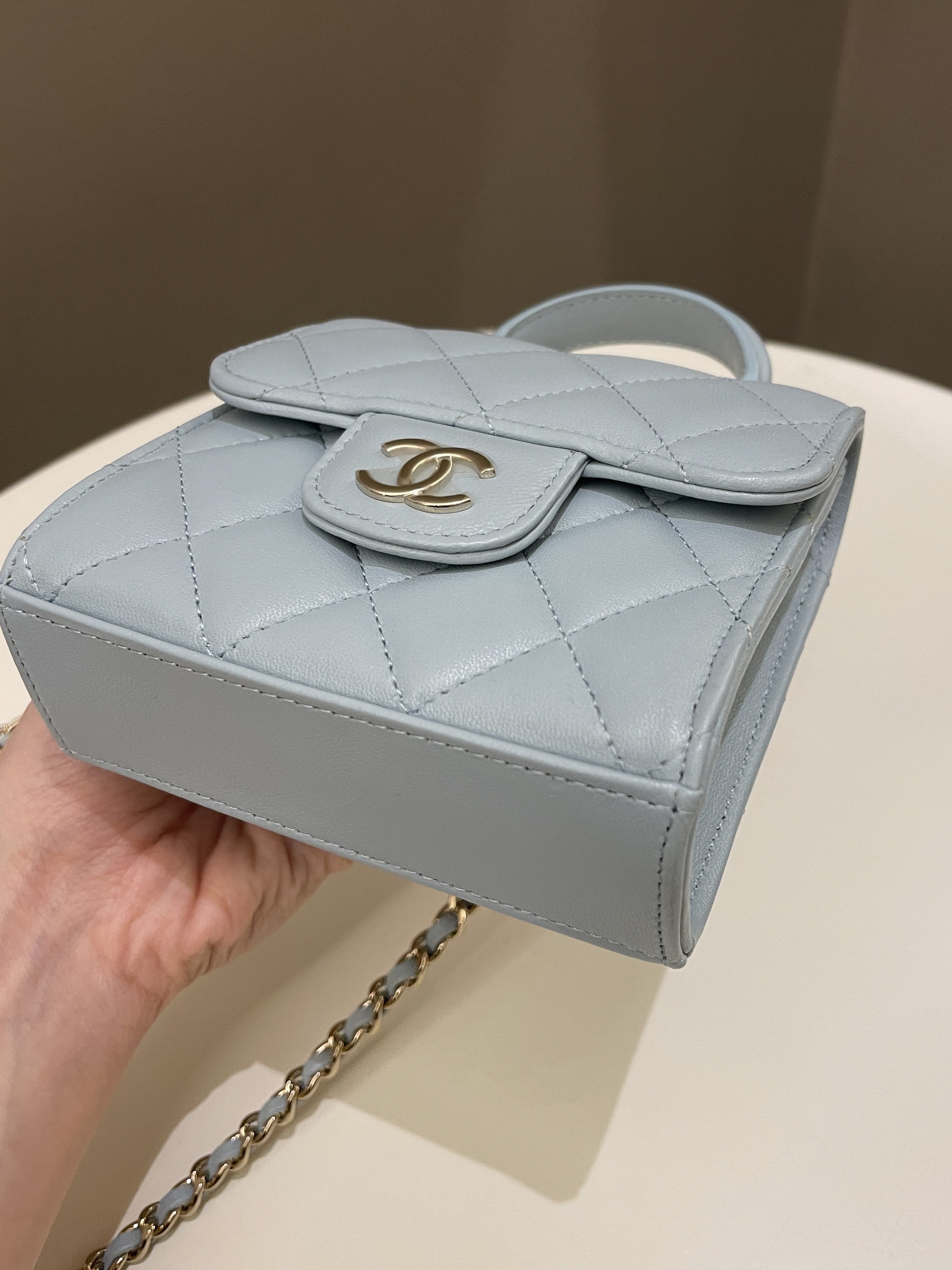 Chanel 22P Top Handle Clutch On Chain Baby Blue Lambskin