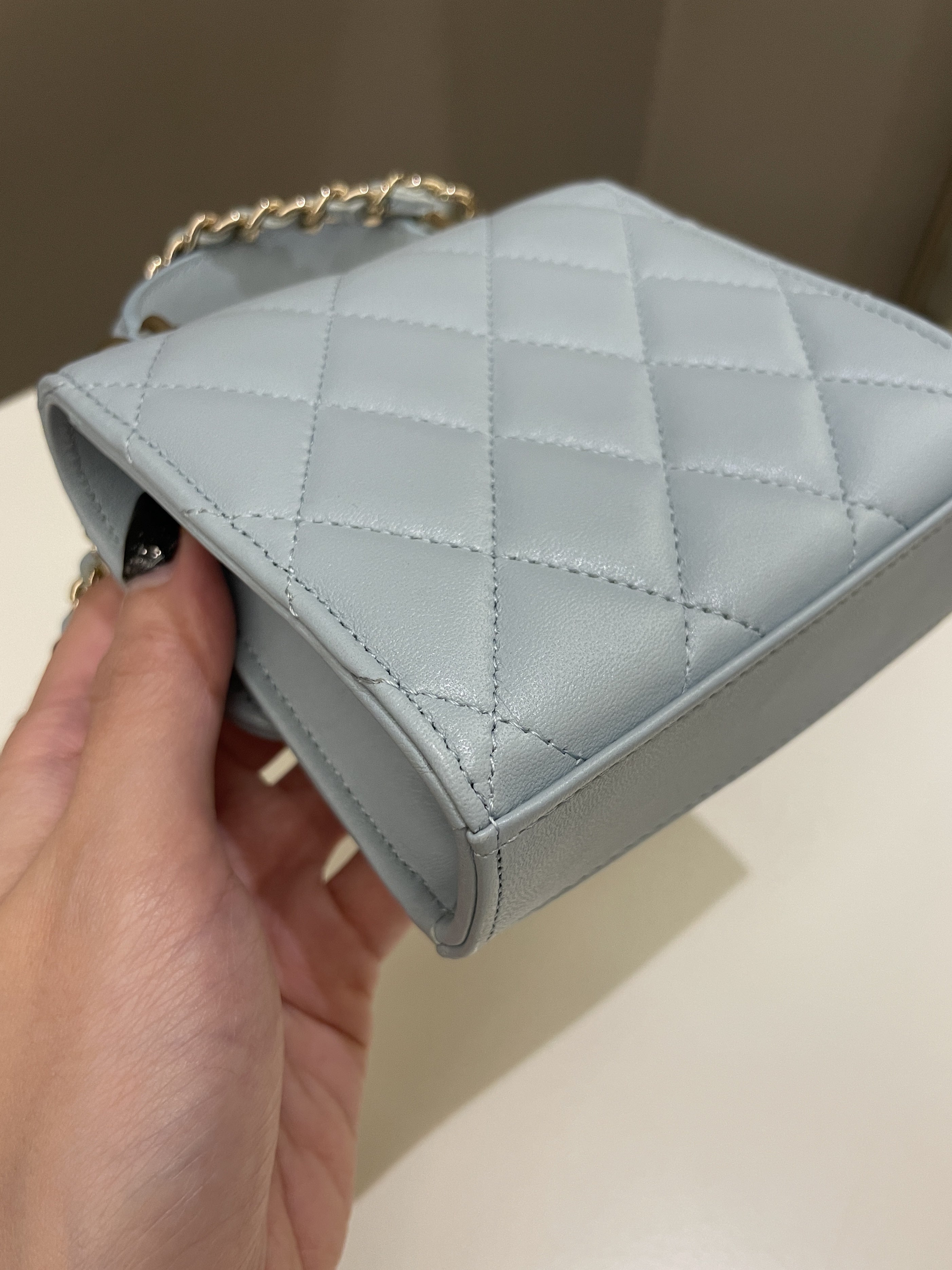 Chanel 22P Top Handle Clutch On Chain Baby Blue Lambskin