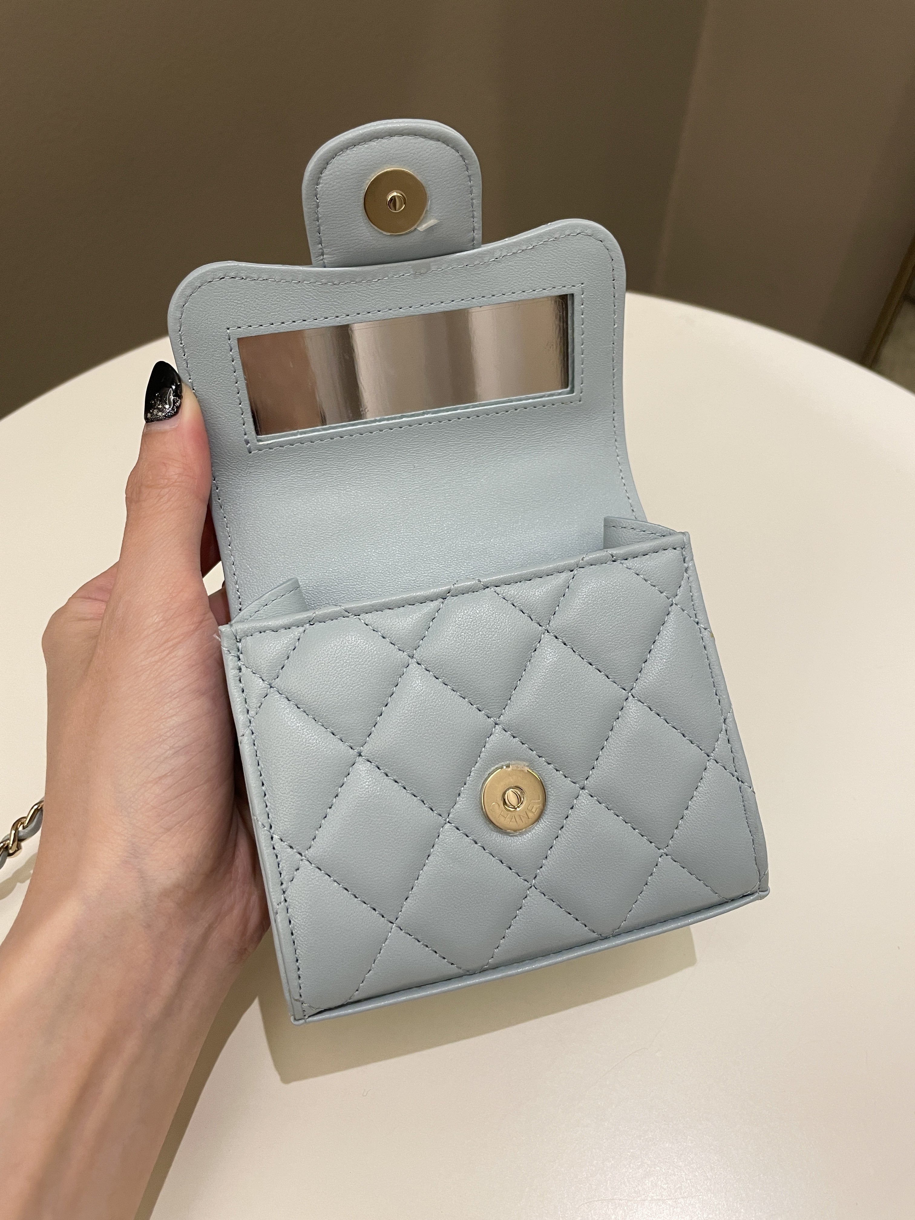 Chanel 22P Top Handle Clutch On Chain Baby Blue Lambskin