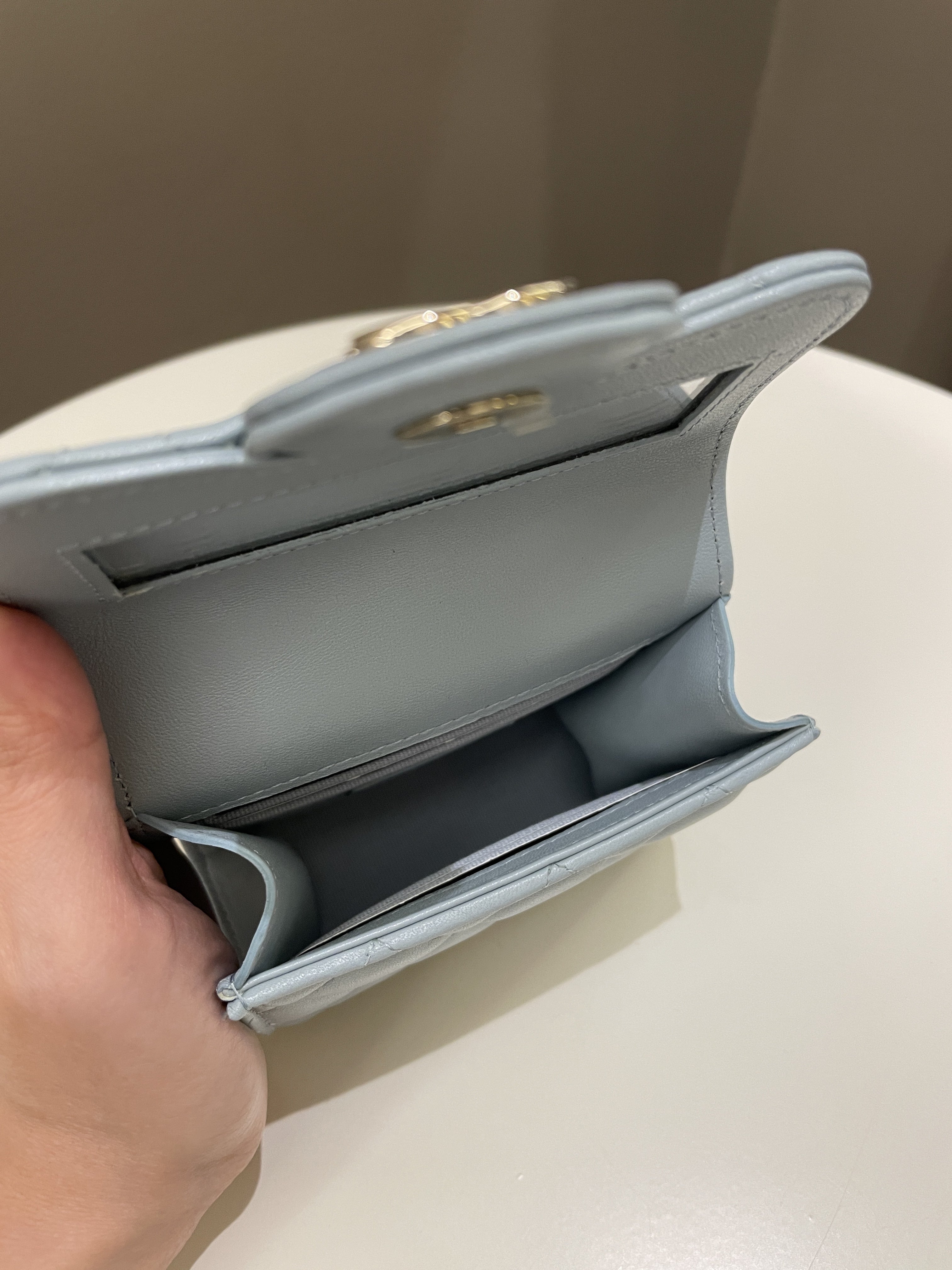 Chanel 22P Top Handle Clutch On Chain Baby Blue Lambskin