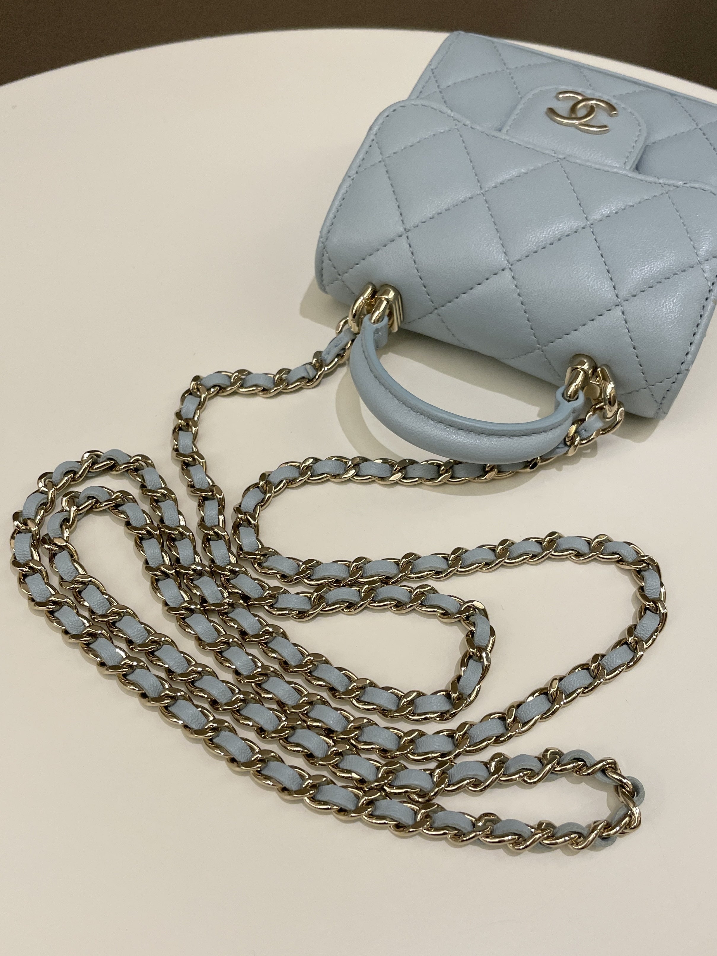 Chanel 22P Top Handle Clutch On Chain Baby Blue Lambskin