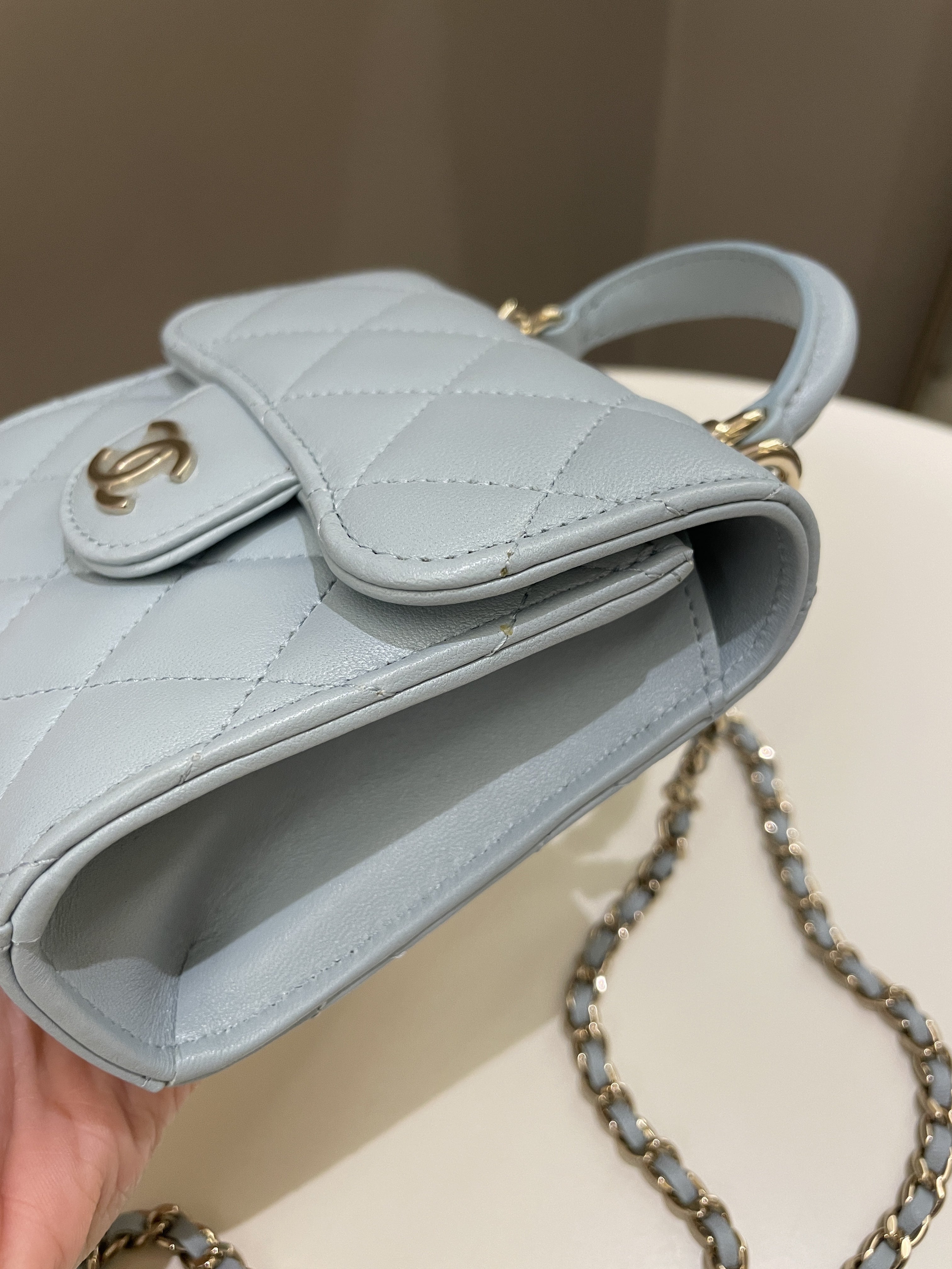 Chanel 22P Top Handle Clutch On Chain Baby Blue Lambskin