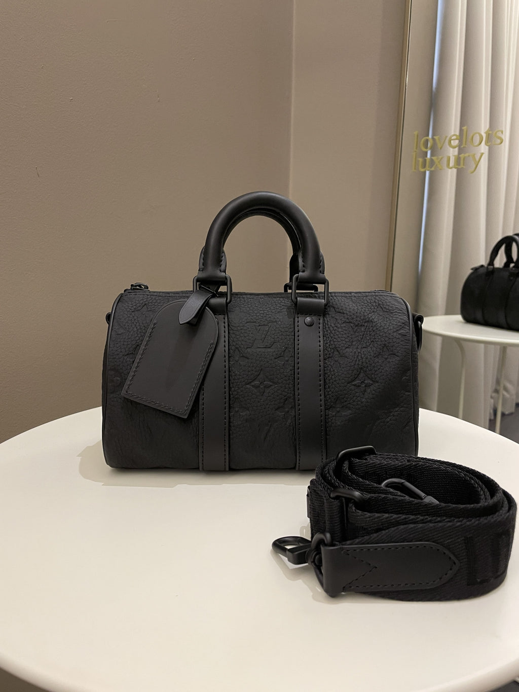 Louis Vuitton Keepall Bandoulier 25 Black Grainy Embossed Monogram