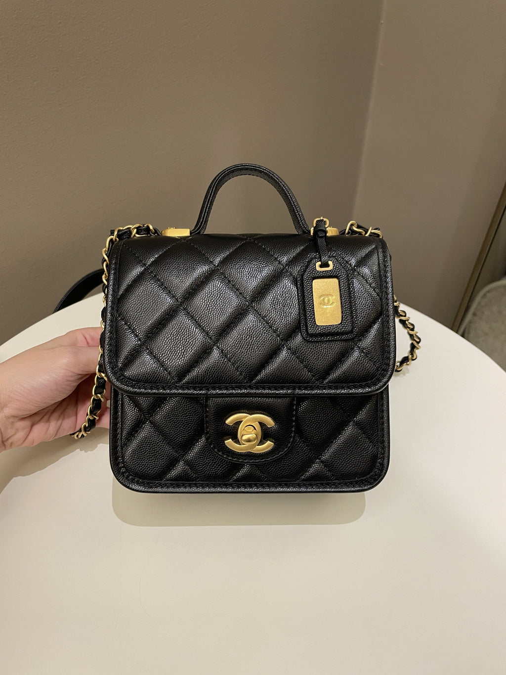 Chanel 22K Top Handle Flap Black Caviar