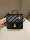 Chanel 22K Top Handle Flap Black Caviar