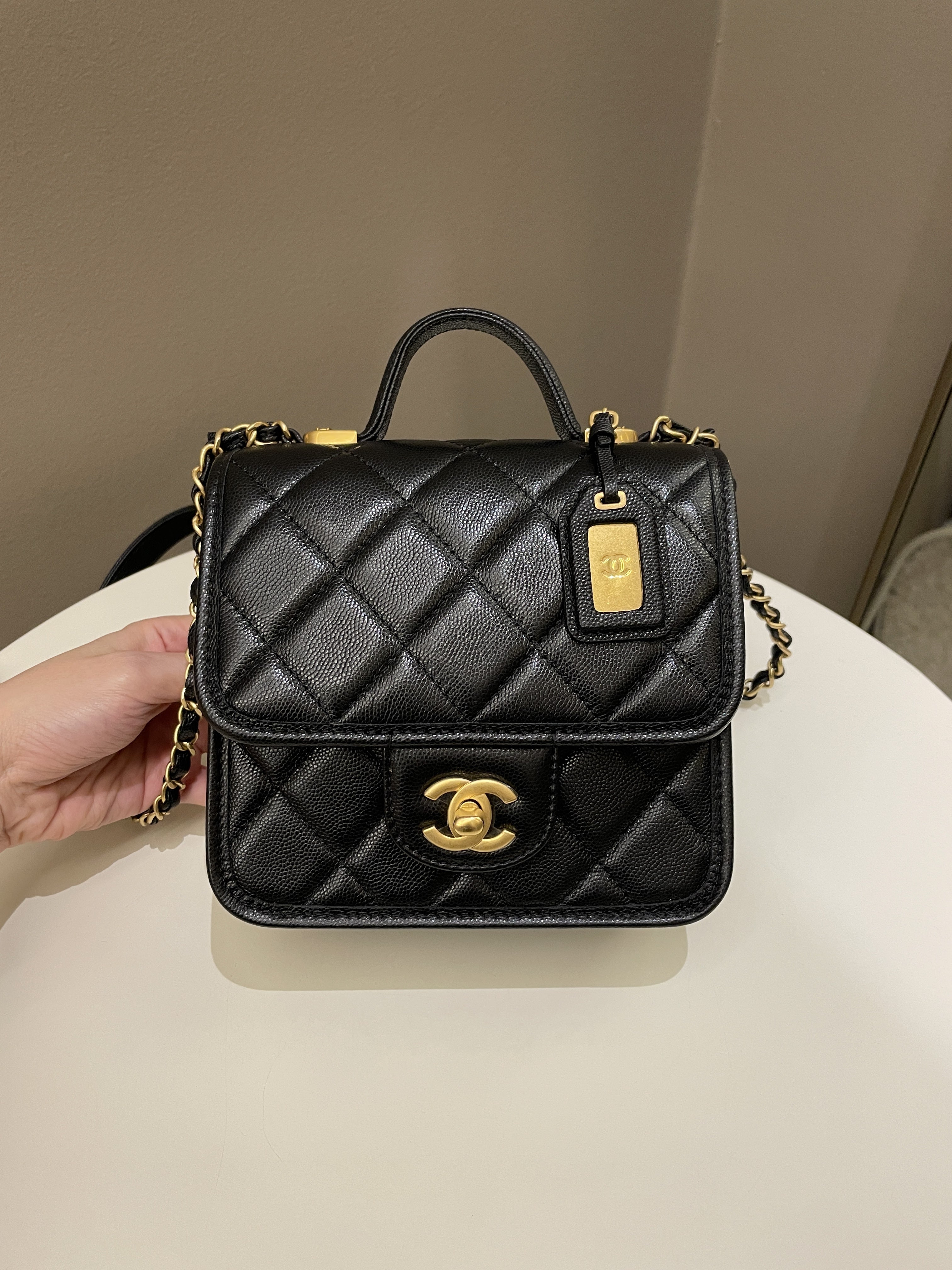 Chanel 22K Top Handle Flap Black Caviar