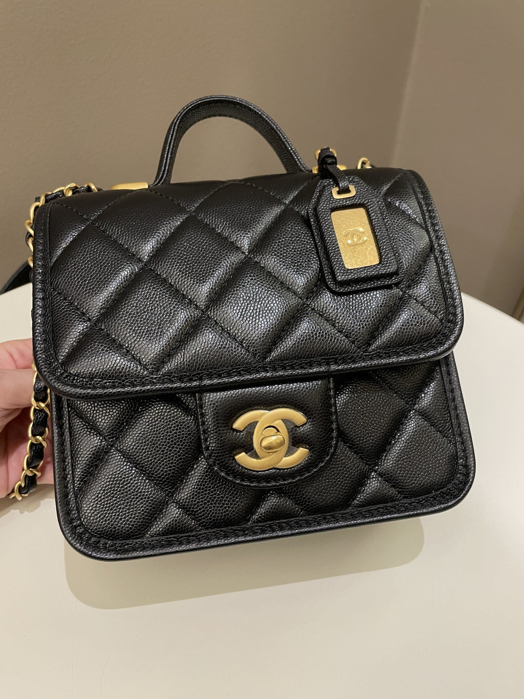 Chanel 22K Top Handle Flap Black Caviar