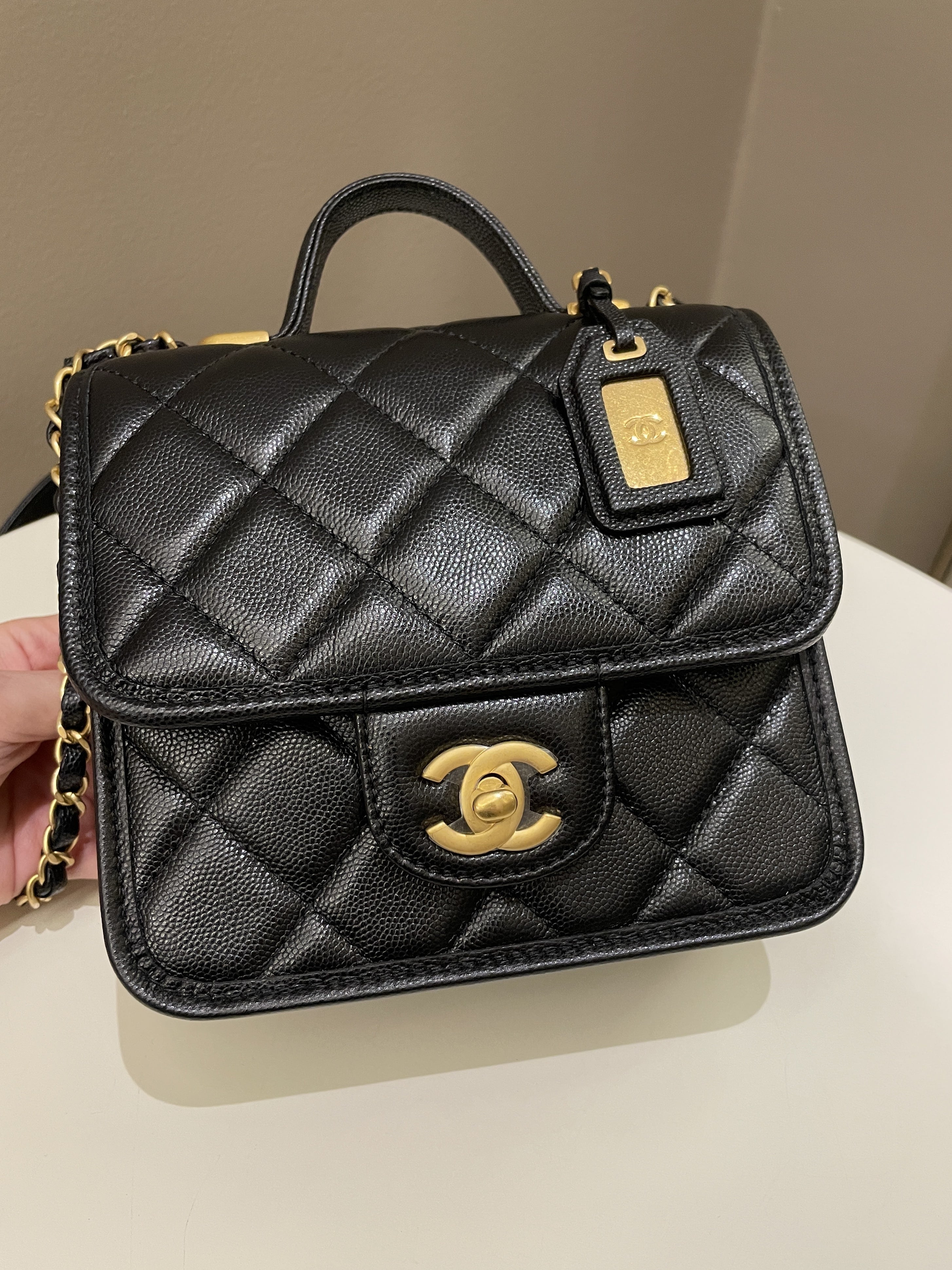 Chanel 22K Top Handle Flap Black Caviar