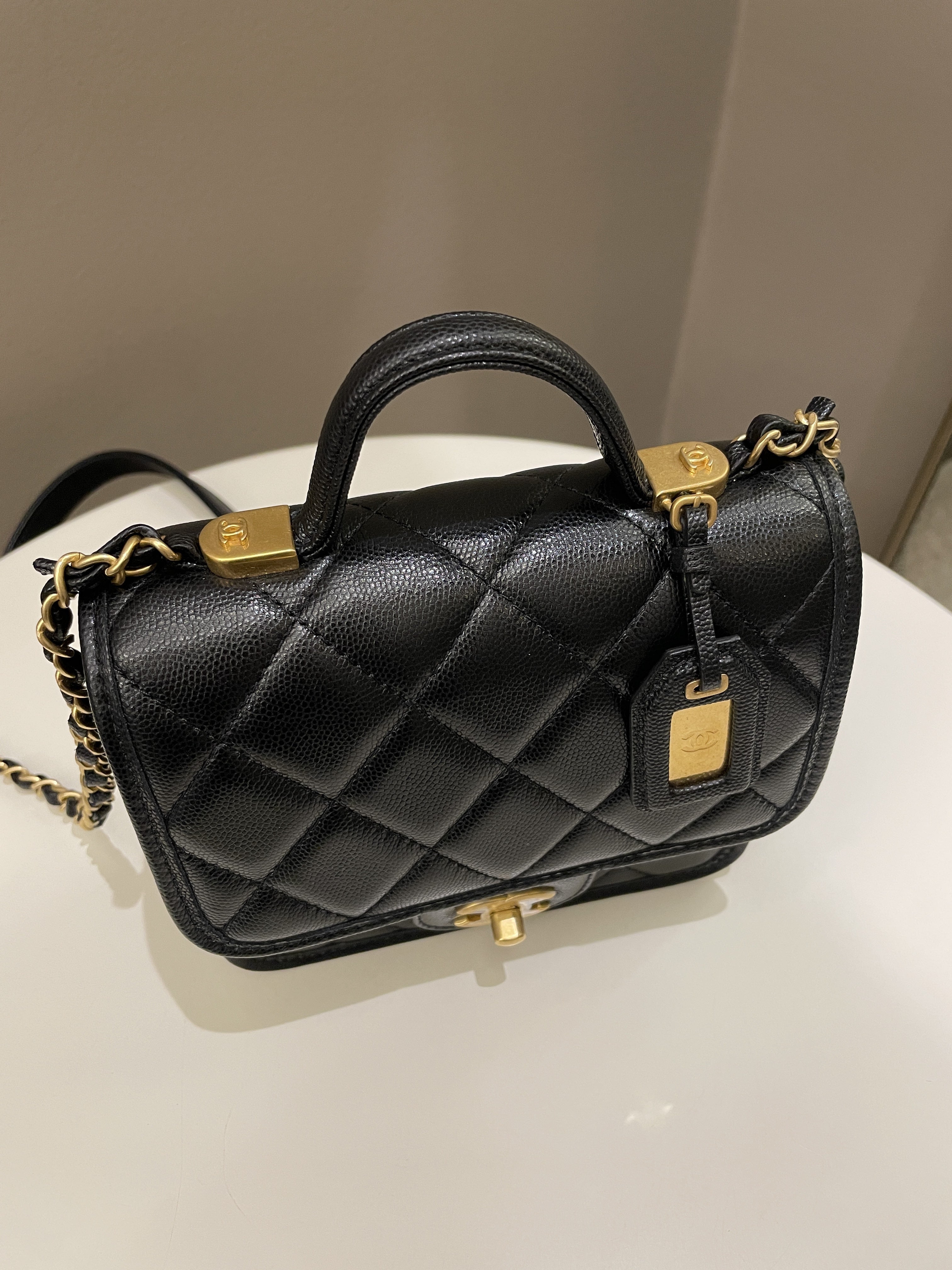 Chanel 22K Top Handle Flap Black Caviar
