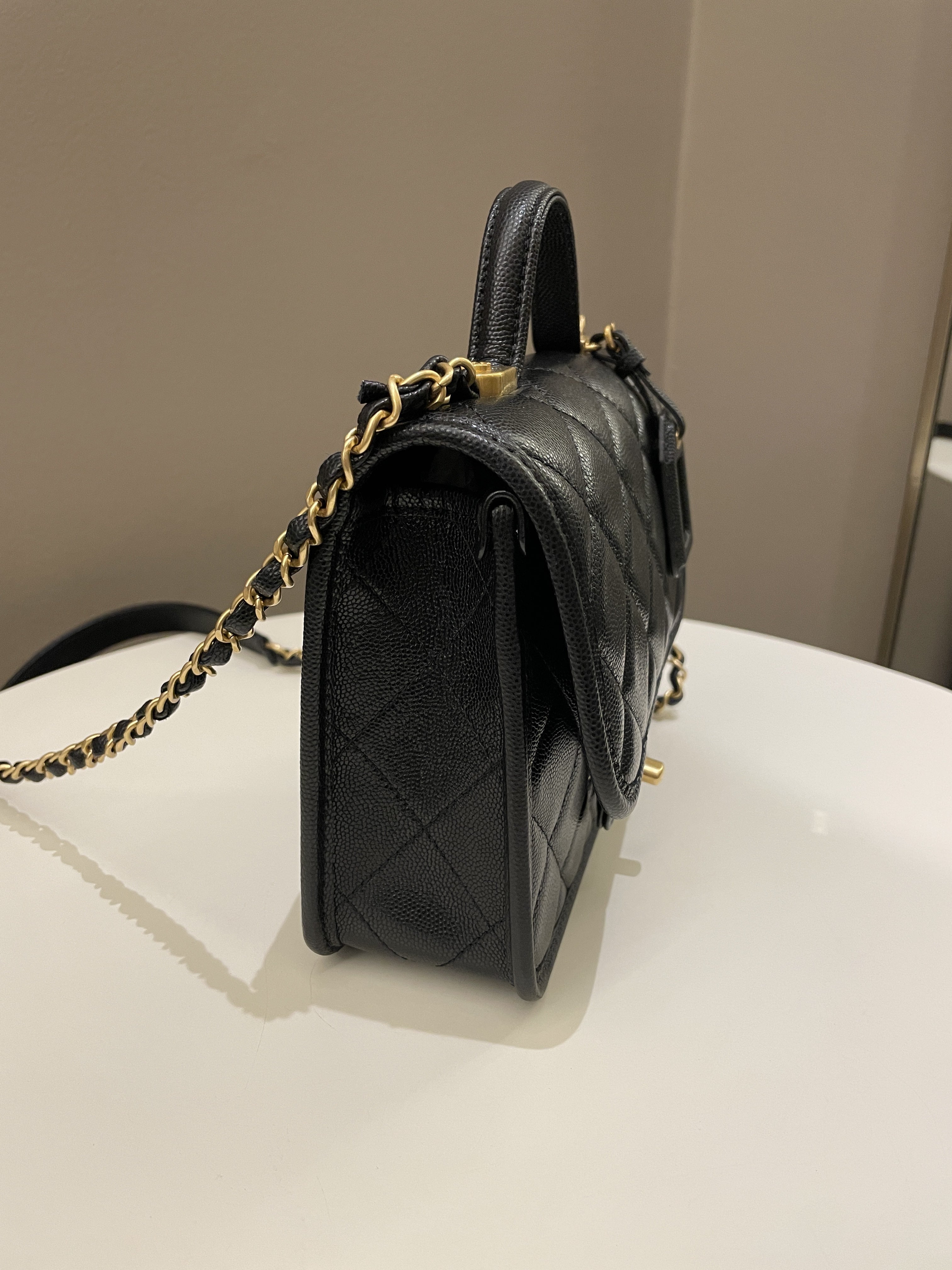 Chanel 22K Top Handle Flap Black Caviar