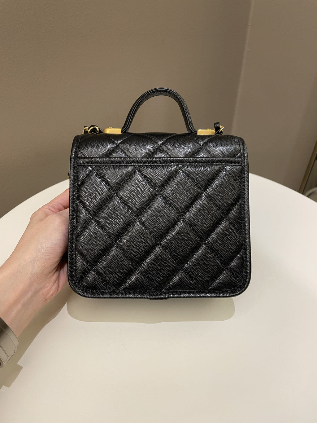Chanel 22K Top Handle Flap Black Caviar