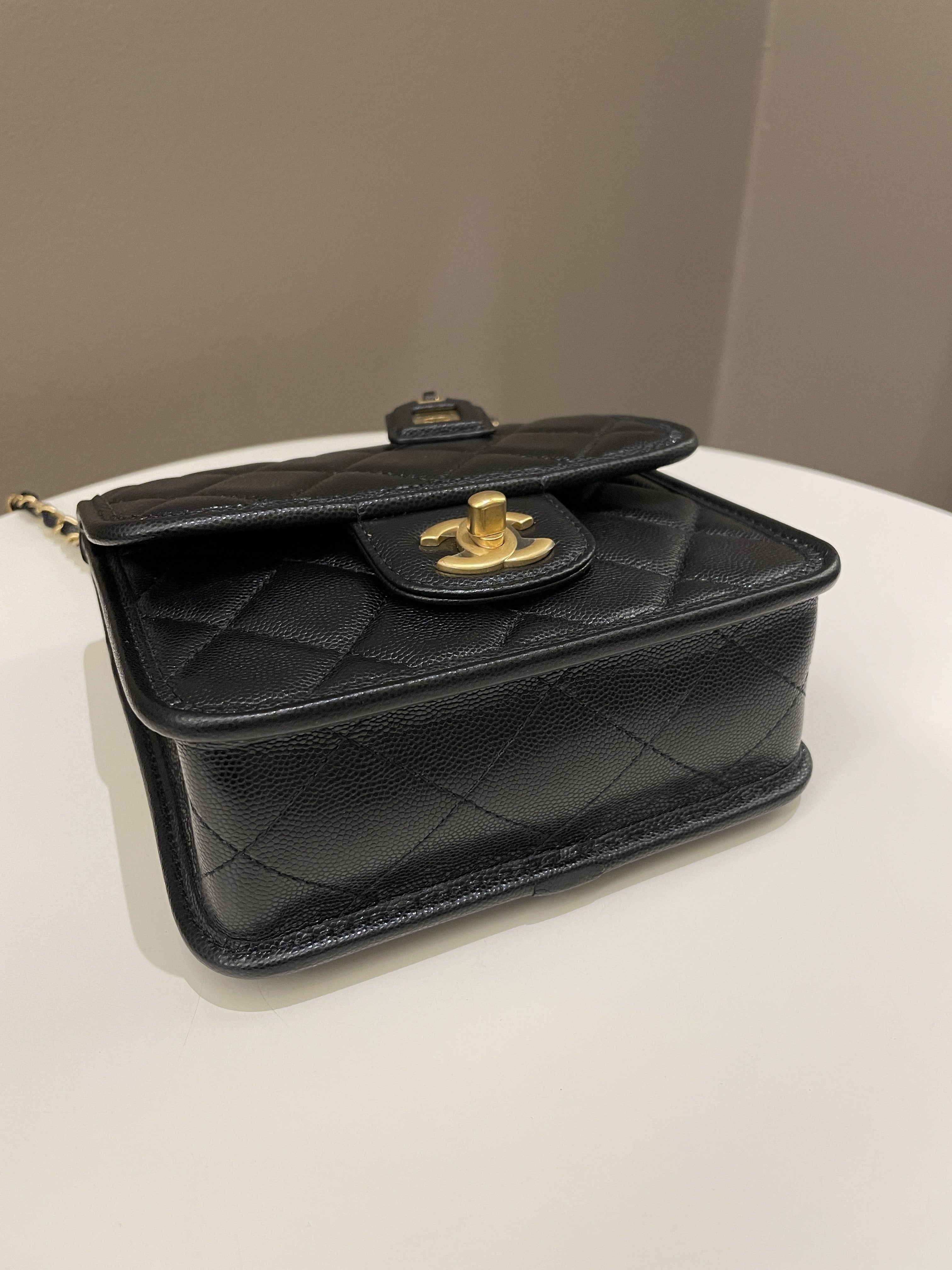 Chanel 22K Top Handle Flap Black Caviar