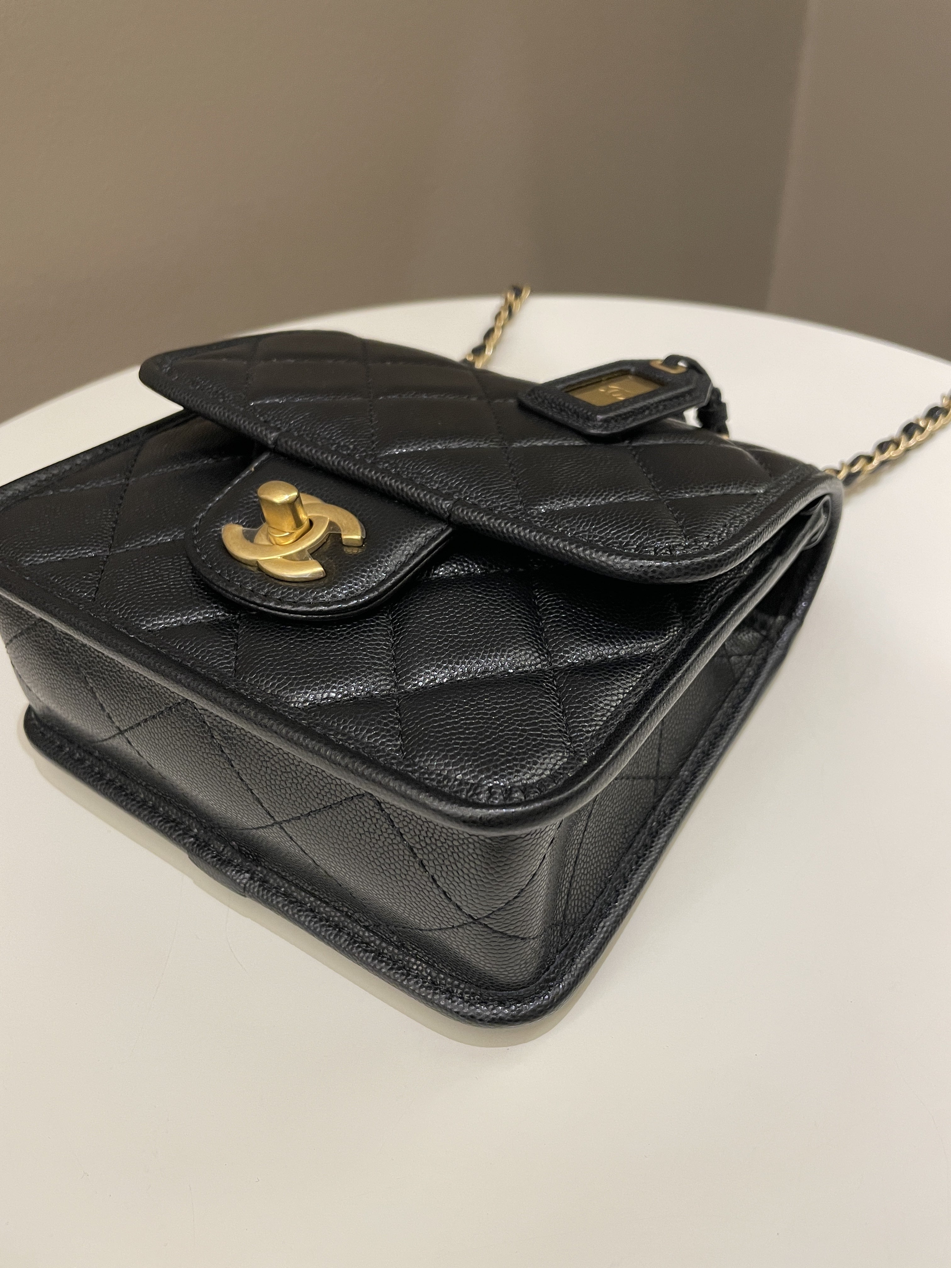 Chanel 22K Top Handle Flap Black Caviar