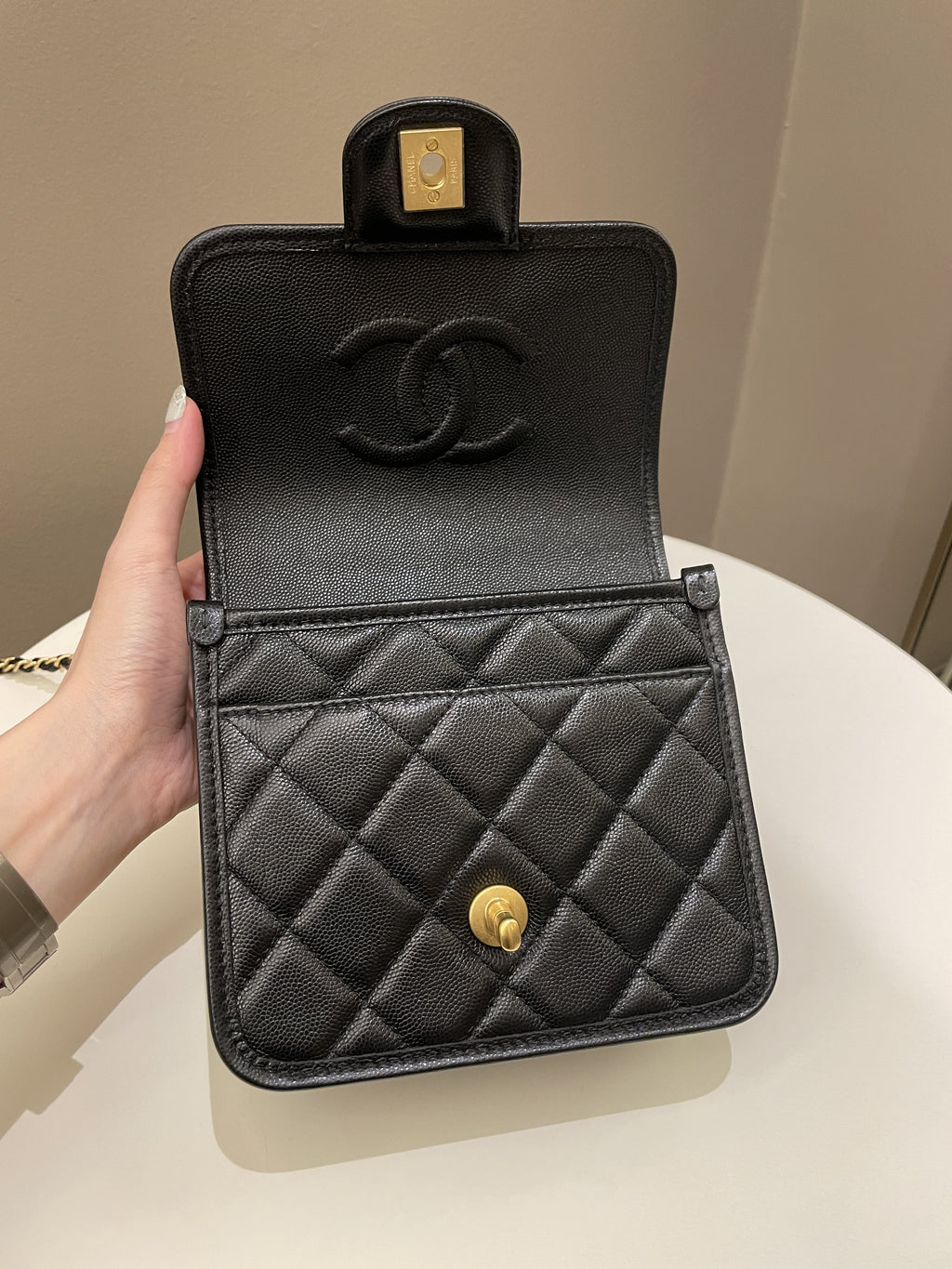 Chanel 22K Top Handle Flap Black Caviar