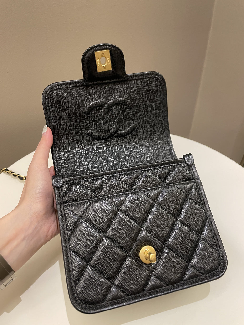 Chanel 22K Top Handle Flap Black Caviar
