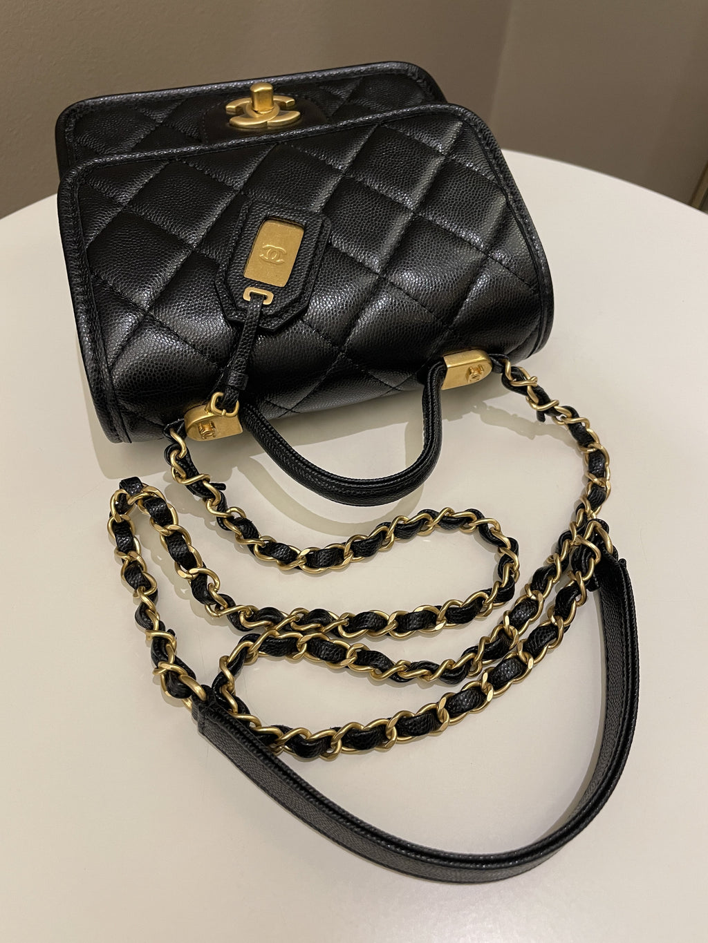 Chanel 22K Top Handle Flap Black Caviar