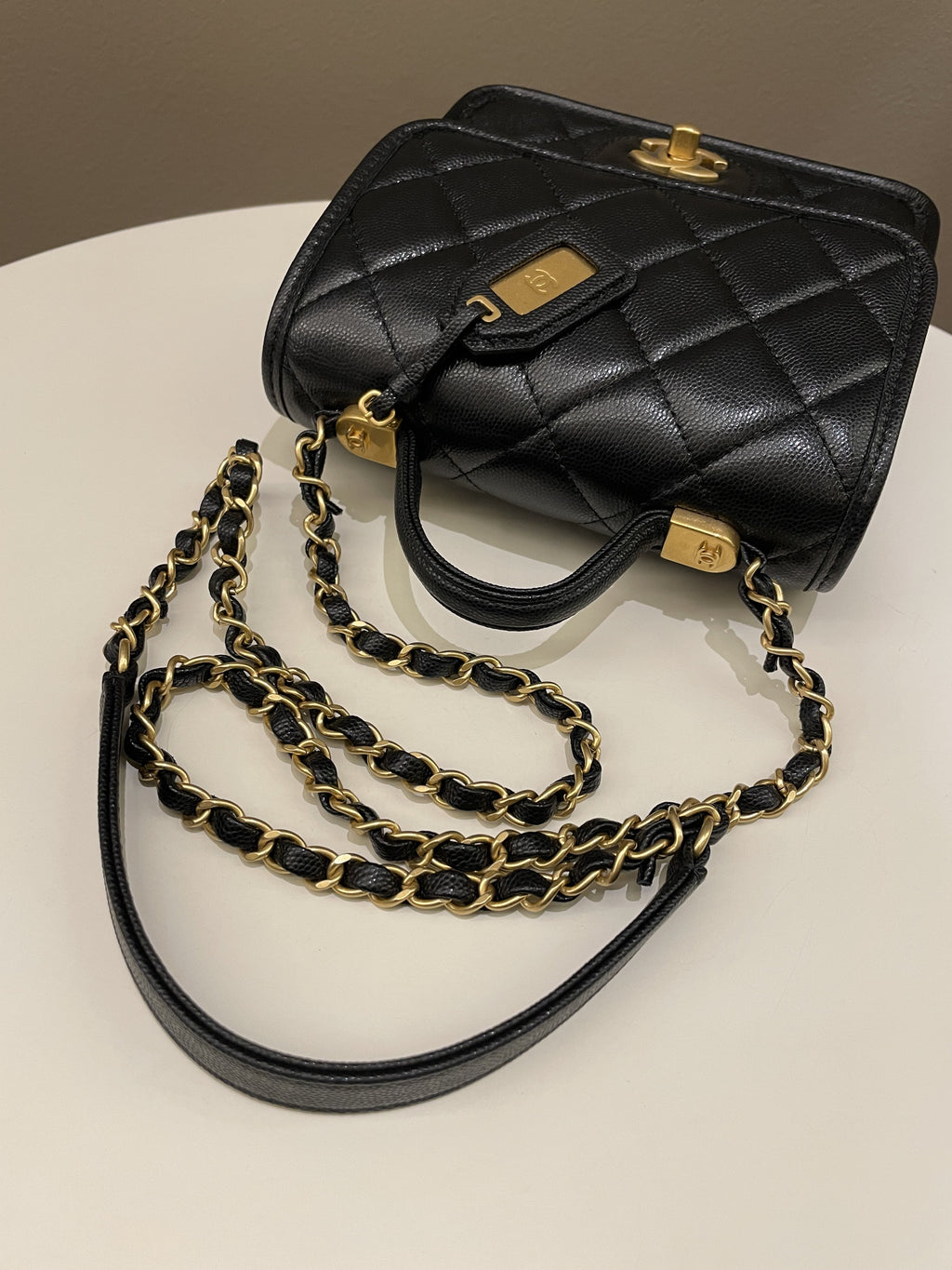 Chanel 22K Top Handle Flap Black Caviar