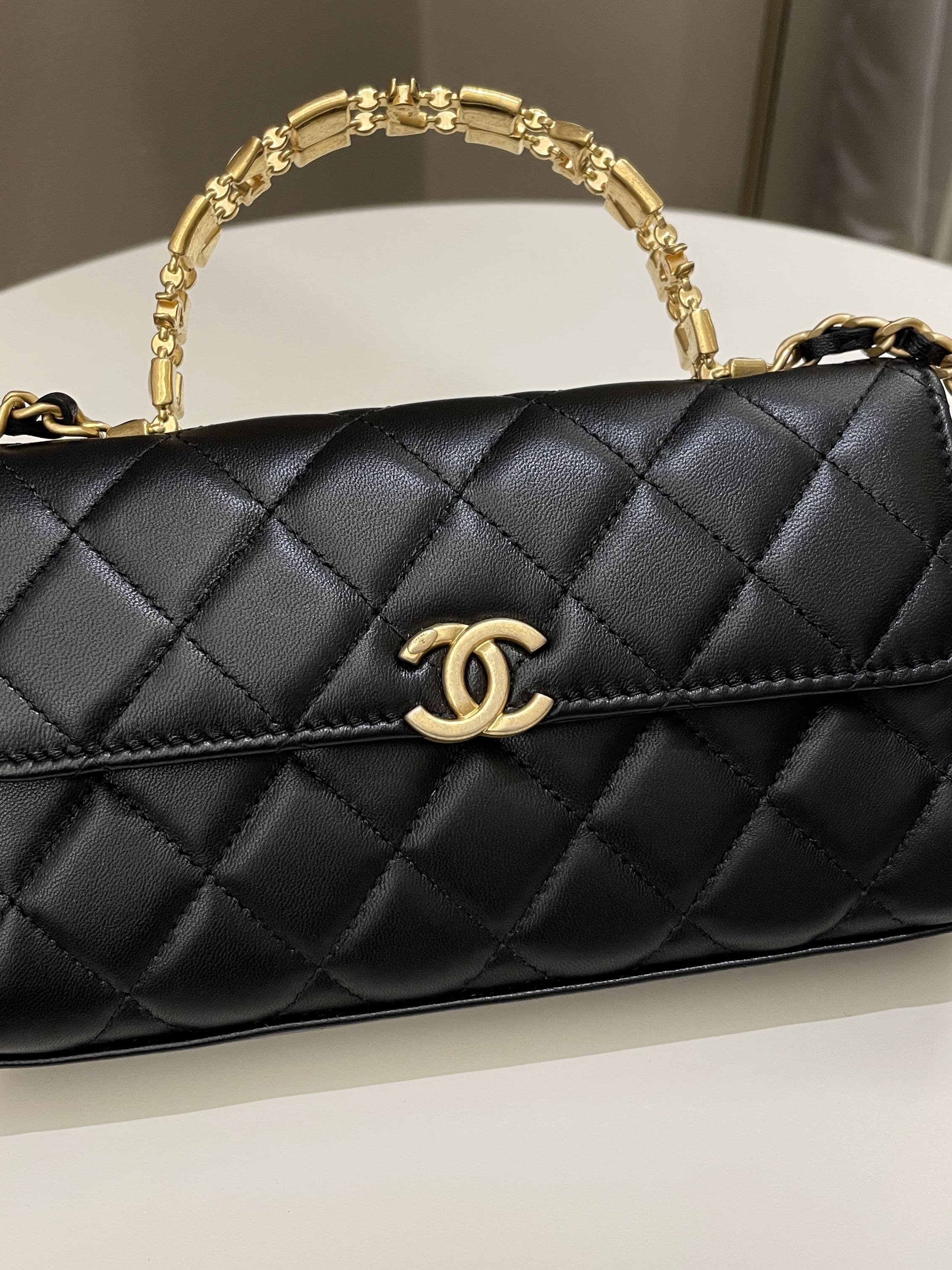 Chanel 22B Quilted Top Handle Flap Bag Black Lambskin