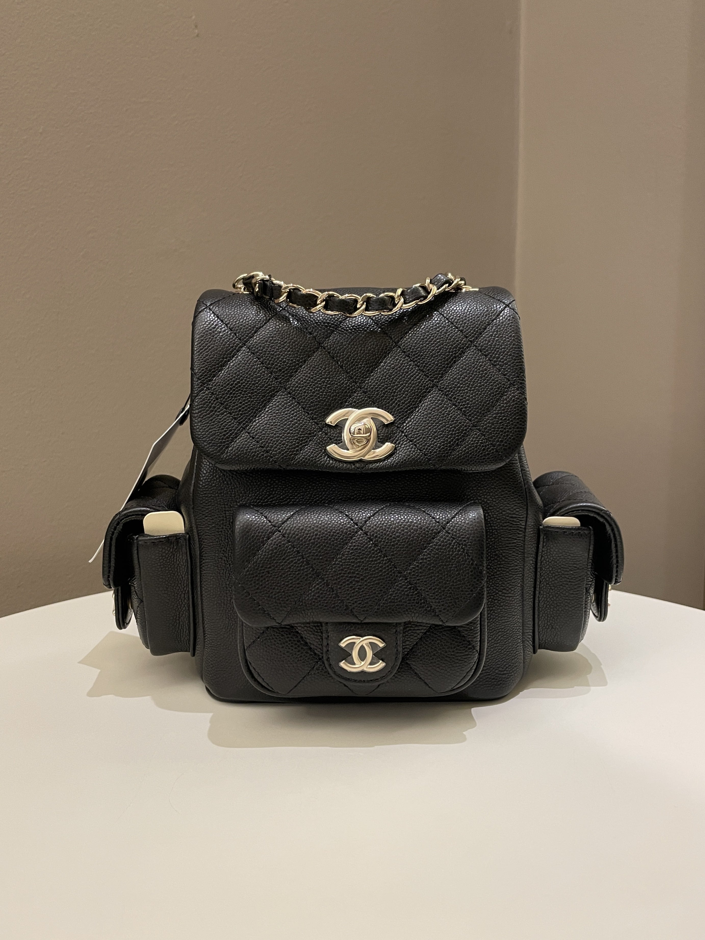 Chanel 23K Quilted Triple Duma Backpack Black Caviar