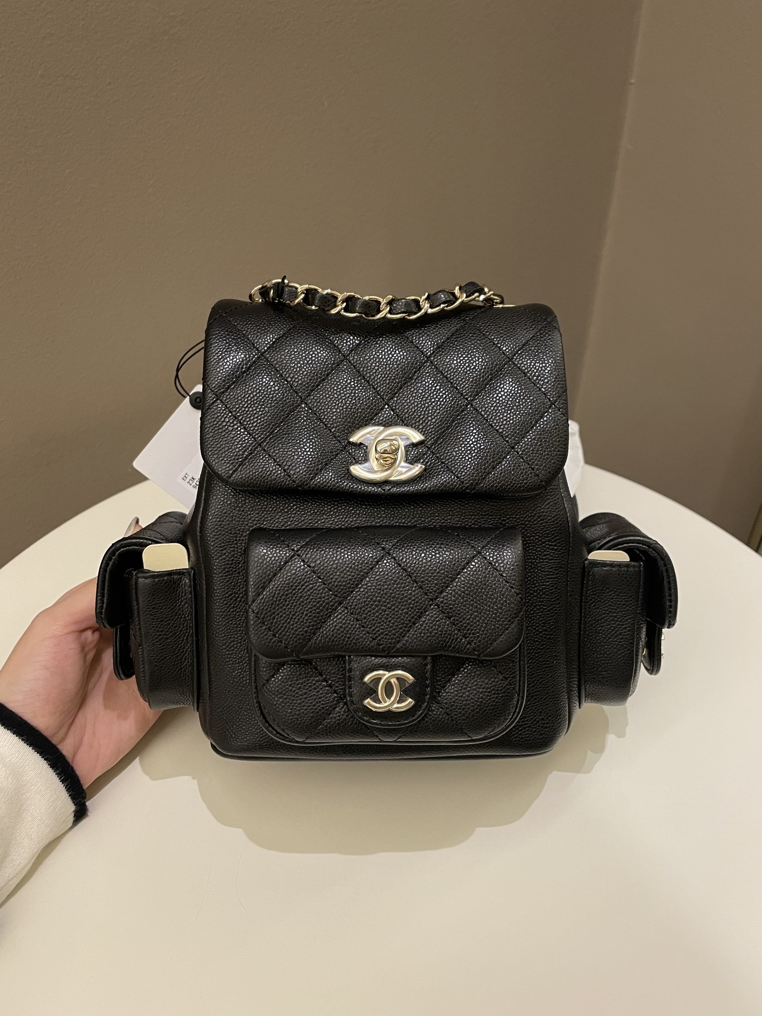 Chanel 23K Quilted Triple Duma Backpack Black Caviar