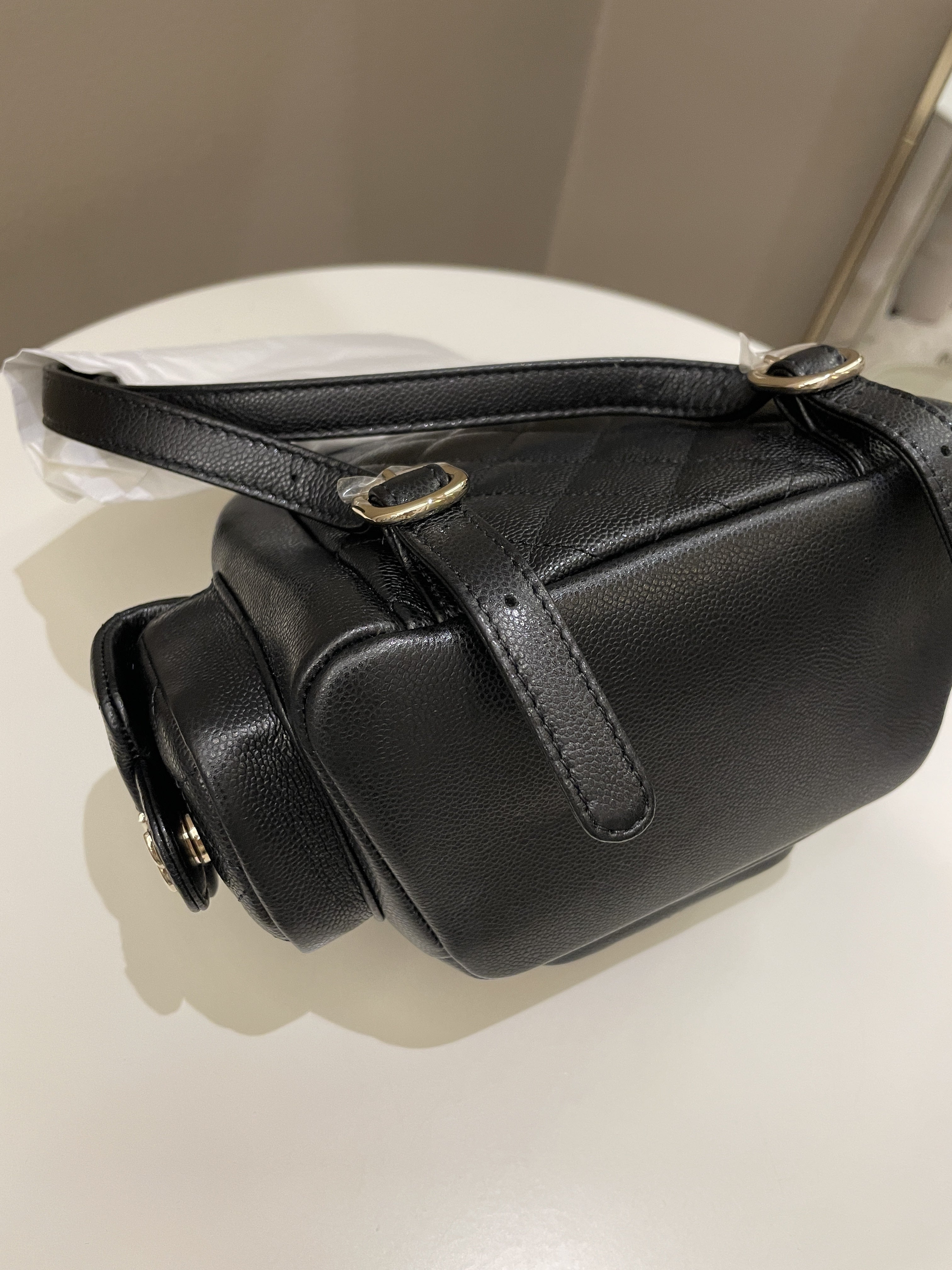 Chanel 23K Quilted Triple Duma Backpack Black Caviar