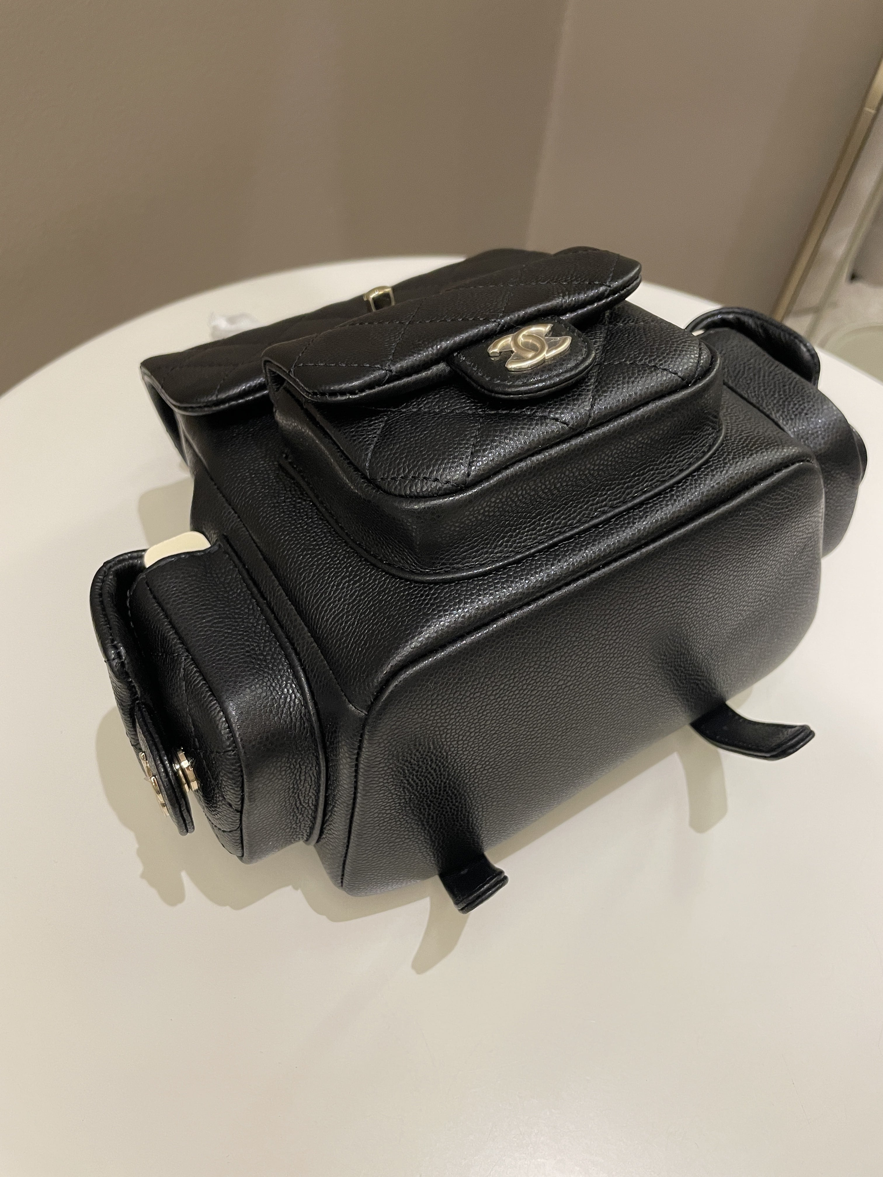 Chanel 23K Quilted Triple Duma Backpack Black Caviar