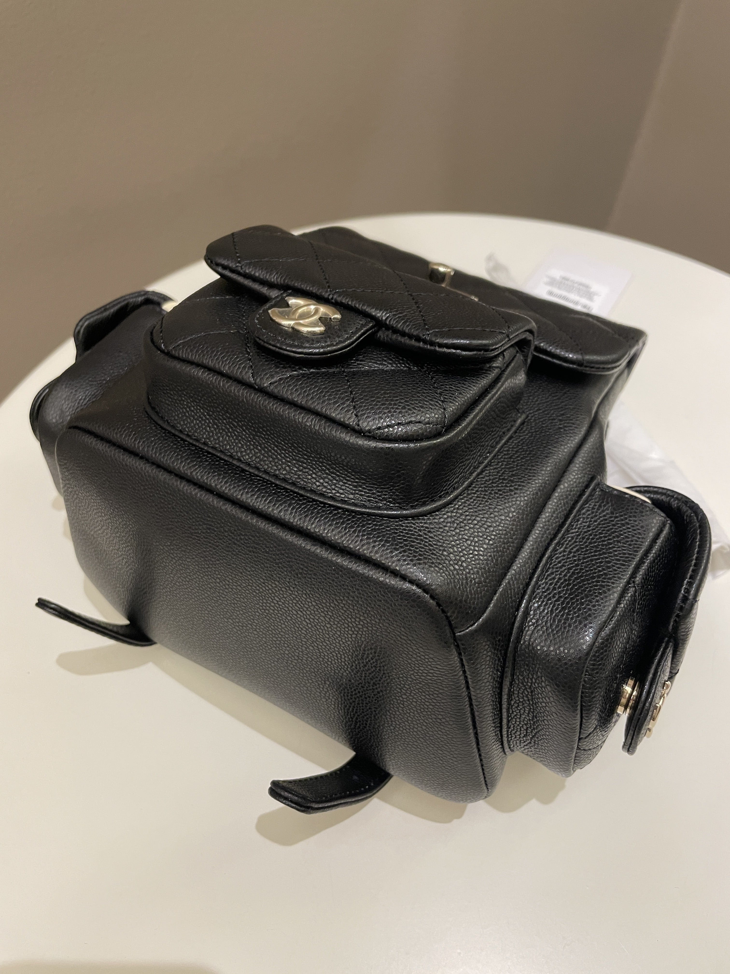 Chanel 23K Quilted Triple Duma Backpack Black Caviar