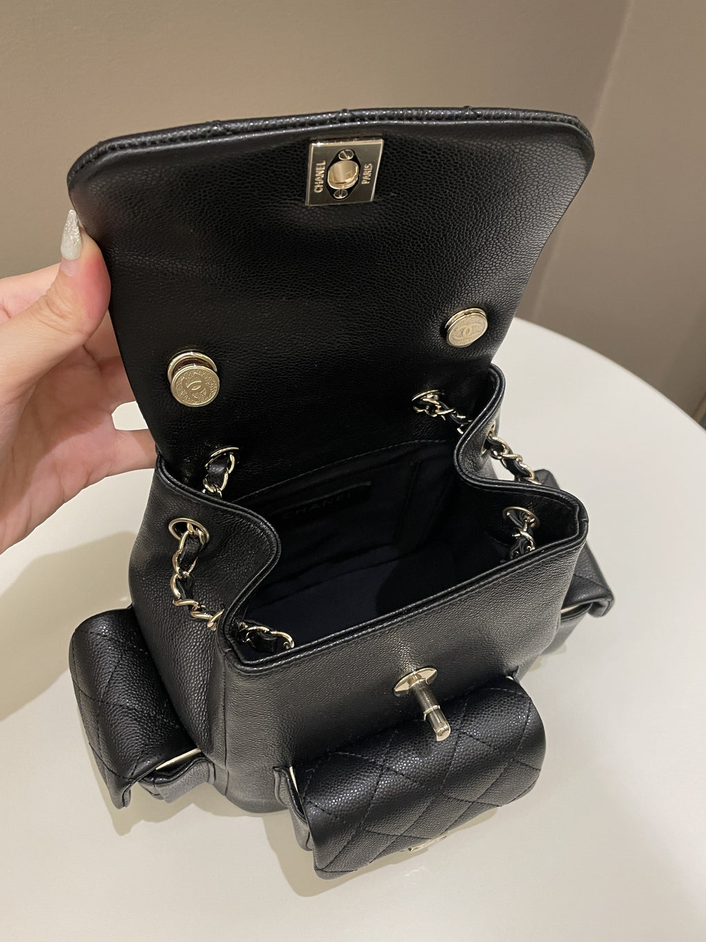 Chanel 23K Quilted Triple Duma Backpack Black Caviar