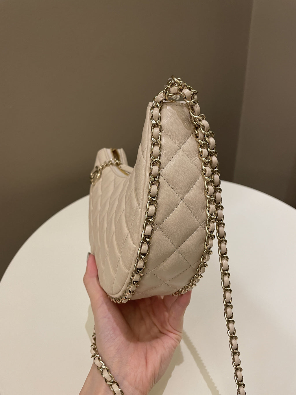 Chanel 23P Quilted Chain Around Hobo Bag Beige Lambskin