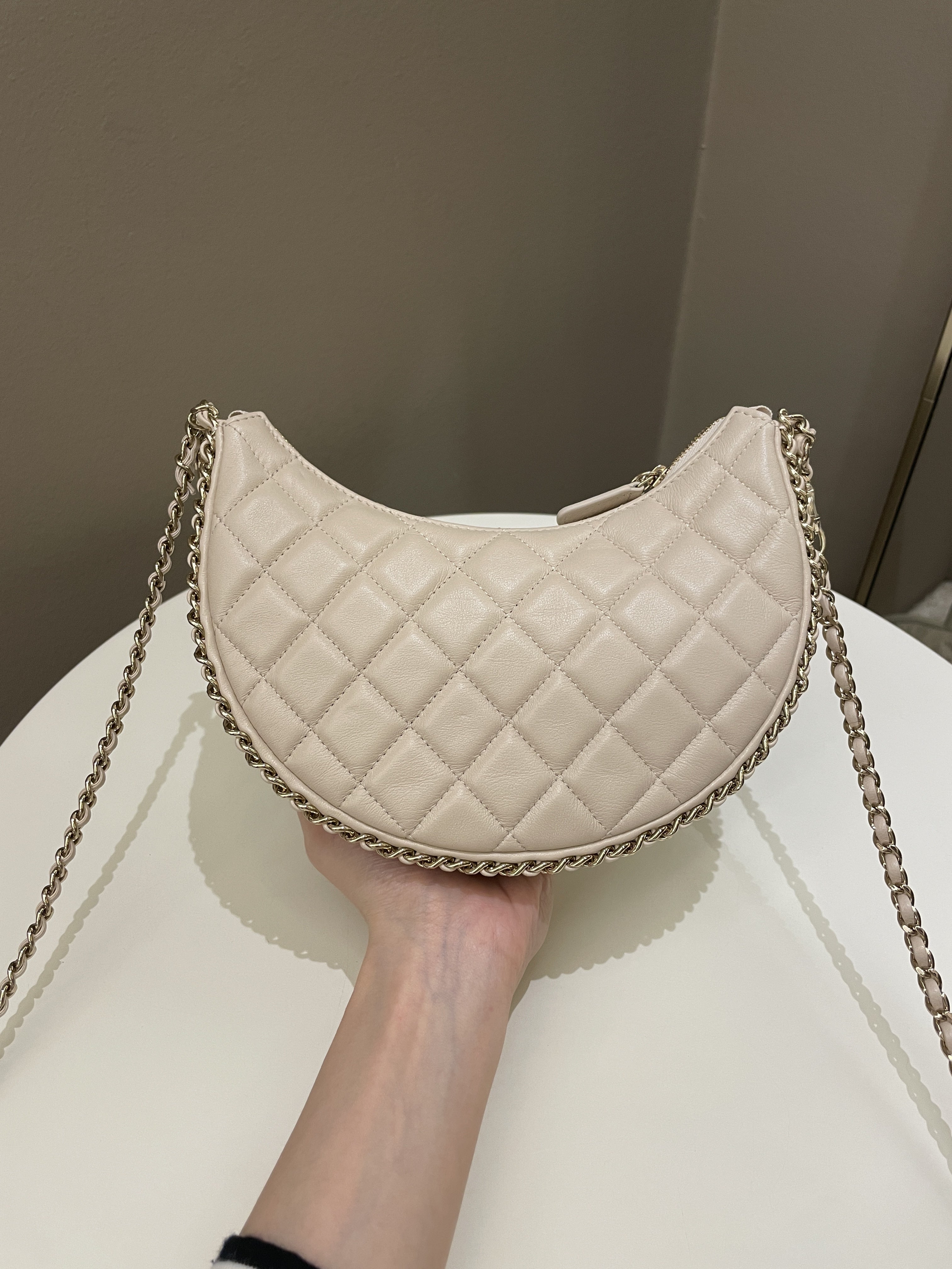 Chanel 23P Quilted Chain Around Hobo Bag Beige Lambskin