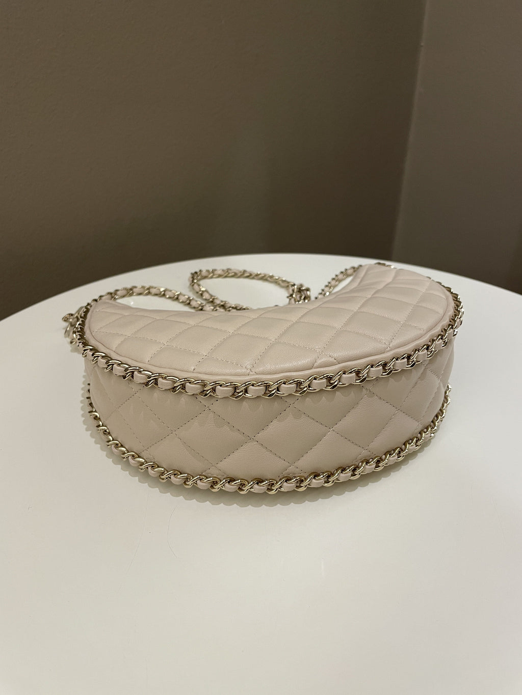 Chanel 23P Quilted Chain Around Hobo Bag Beige Lambskin