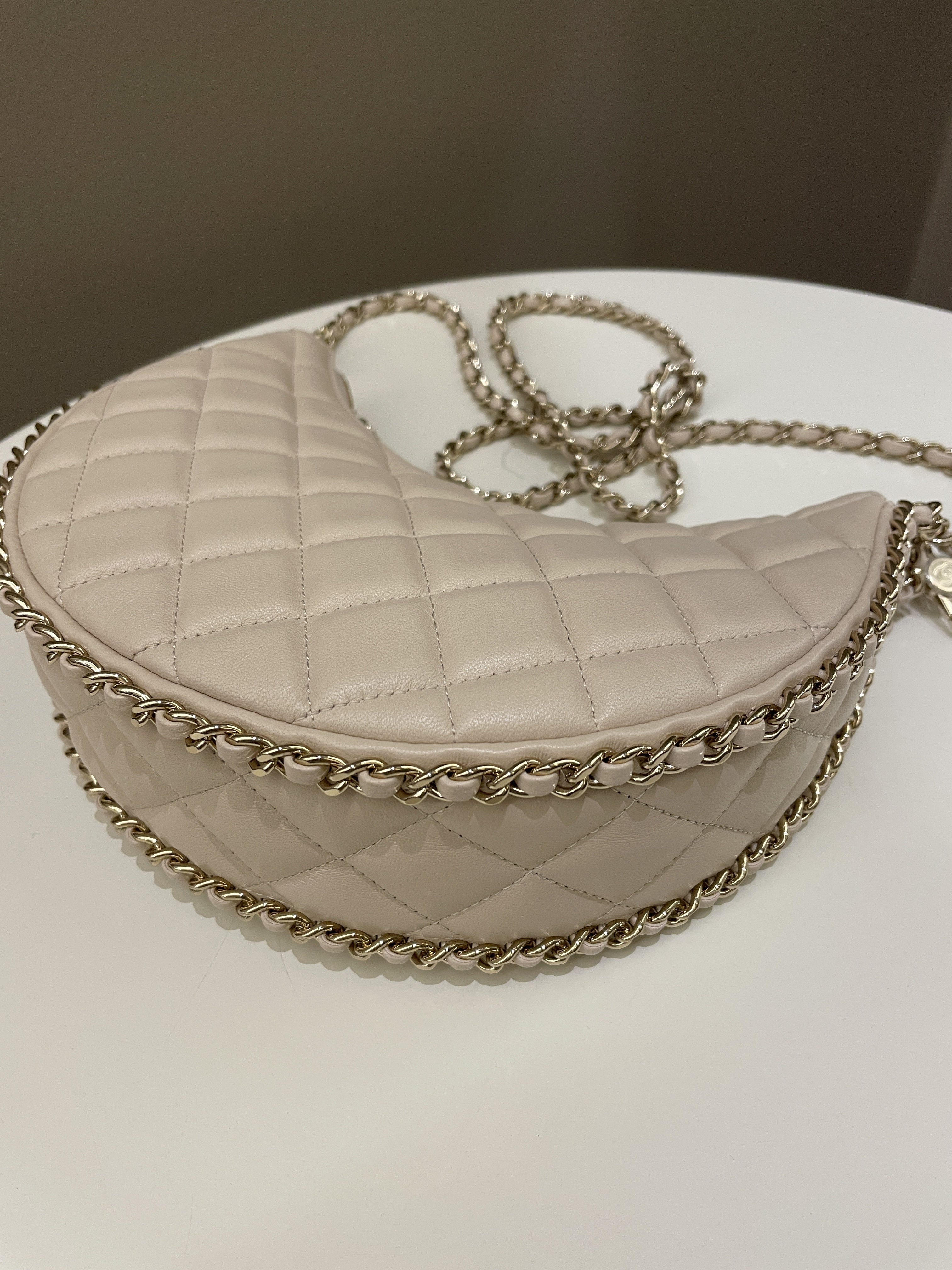 Chanel 23P Quilted Chain Around Hobo Bag Beige Lambskin