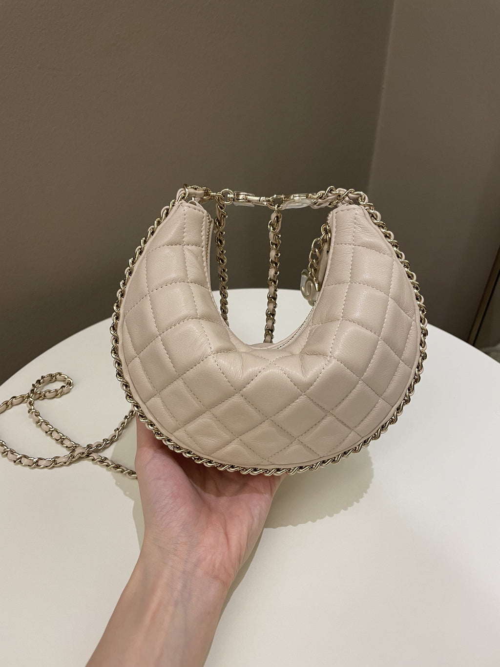 Chanel 23P Quilted Chain Around Hobo Bag Beige Lambskin