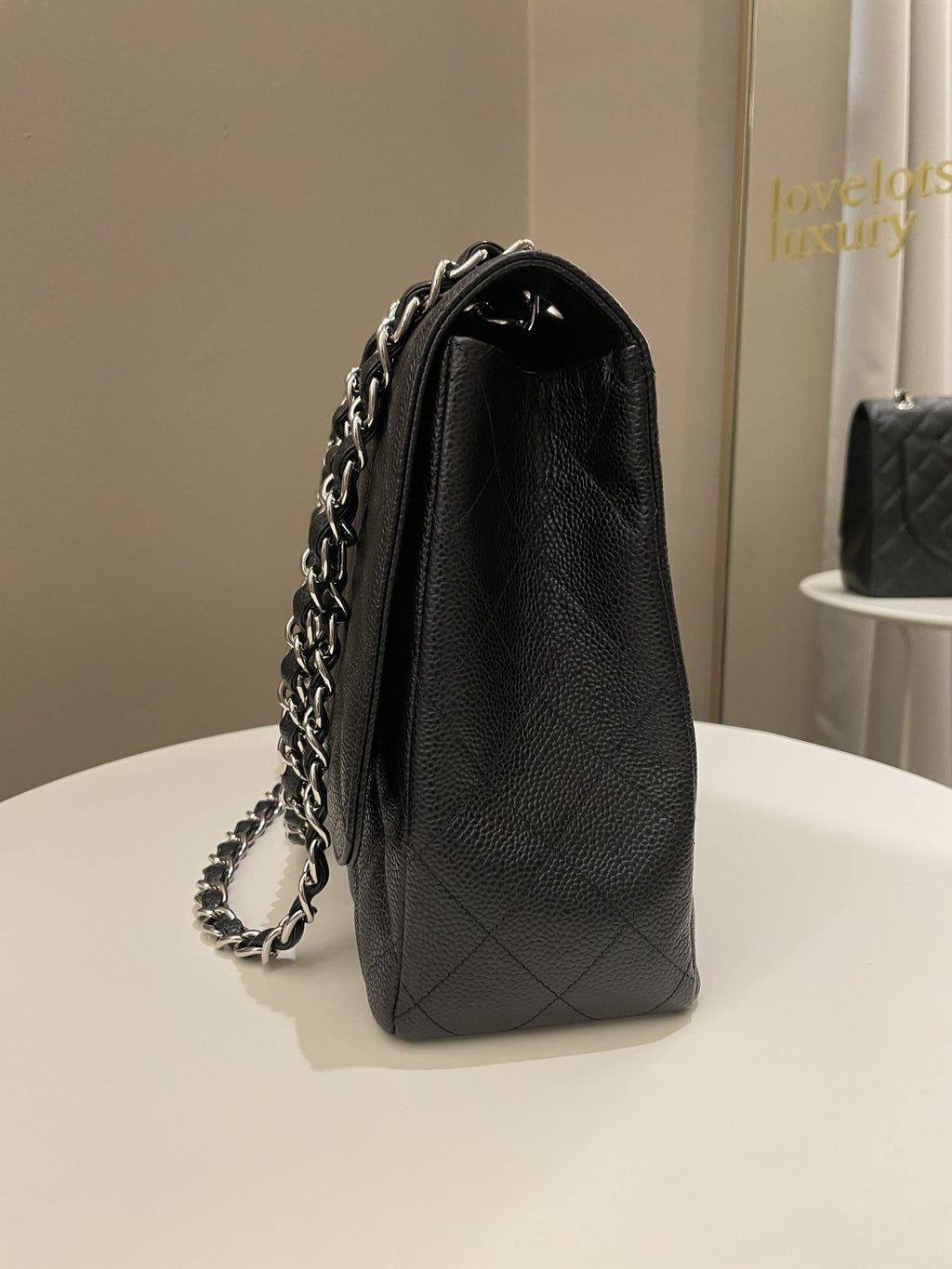 Chanel Classic Quilted Maxi Single Flap Black Caviar