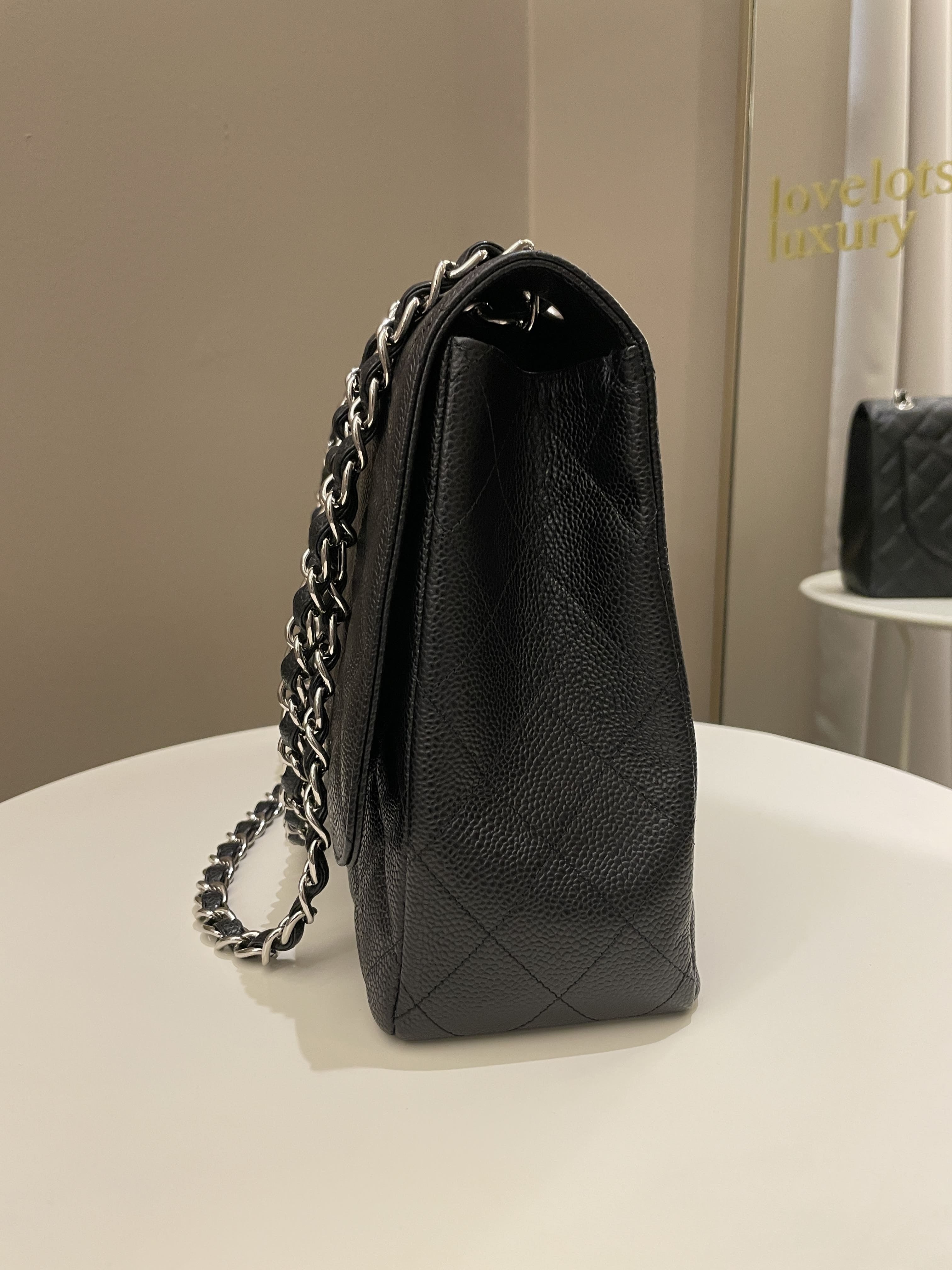 Chanel Classic Quilted Maxi Single Flap Black Caviar
