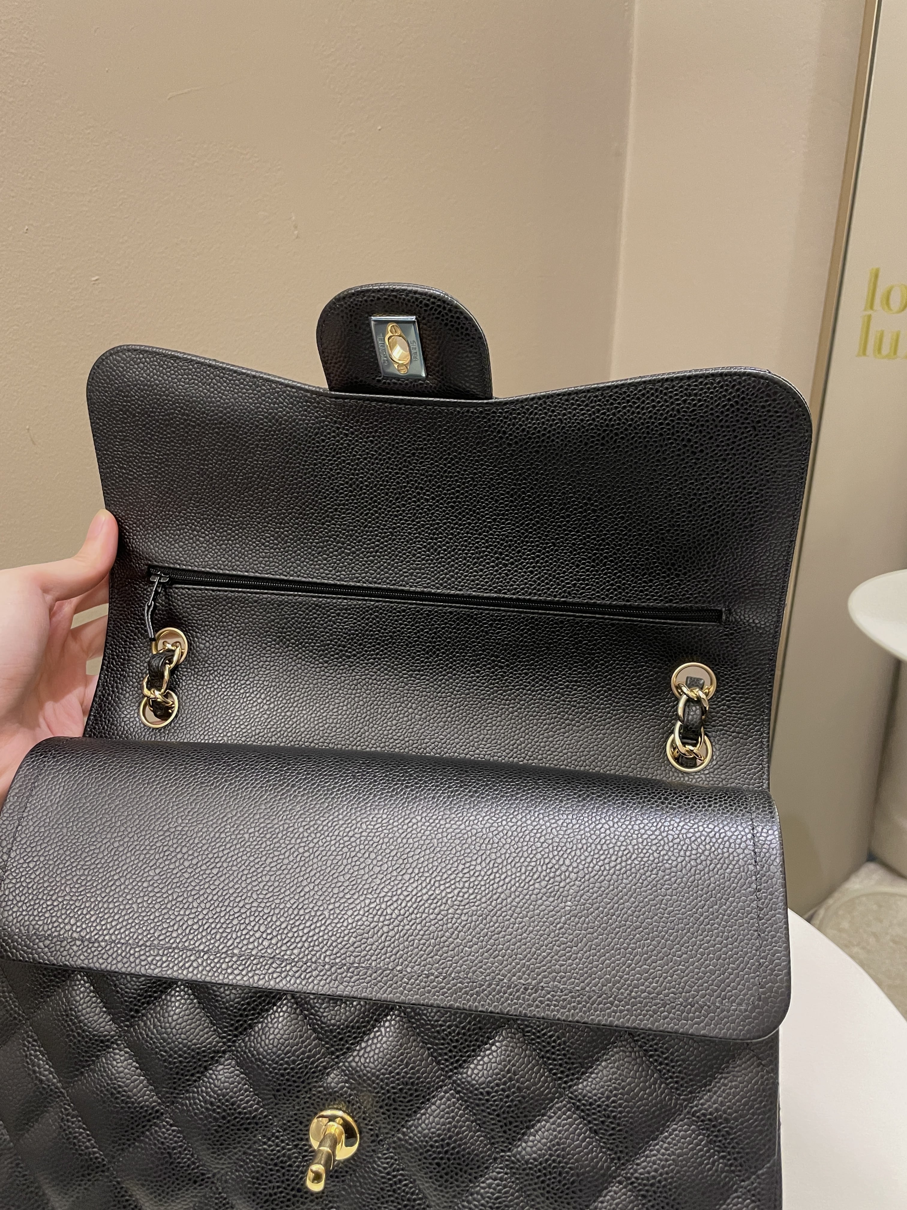 Chanel Classic Quilted Jumbo Double Flap Black Caviar