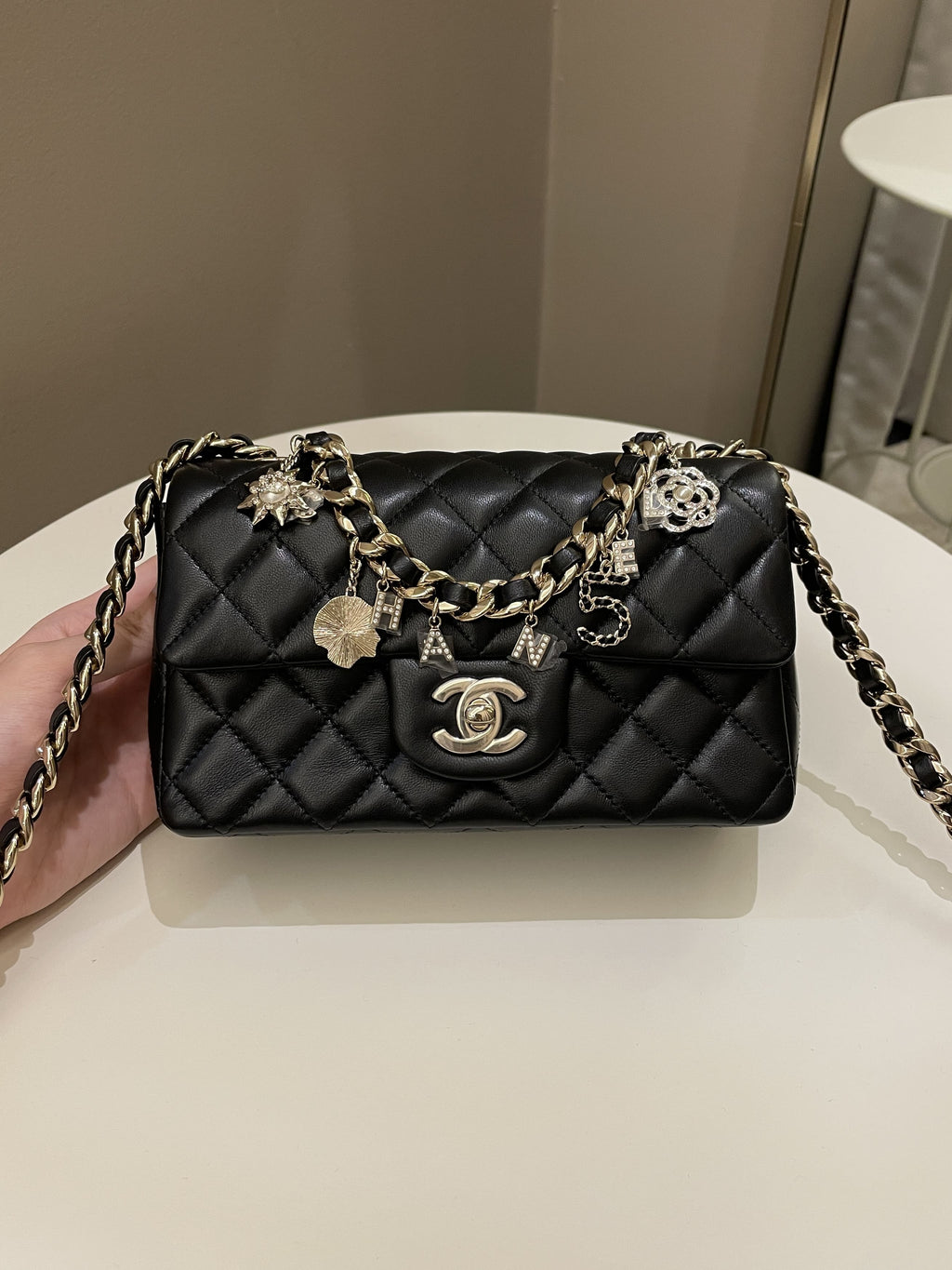 Chanel Quilted Mini Coco Charms Rectangular Flap Black Lambskin