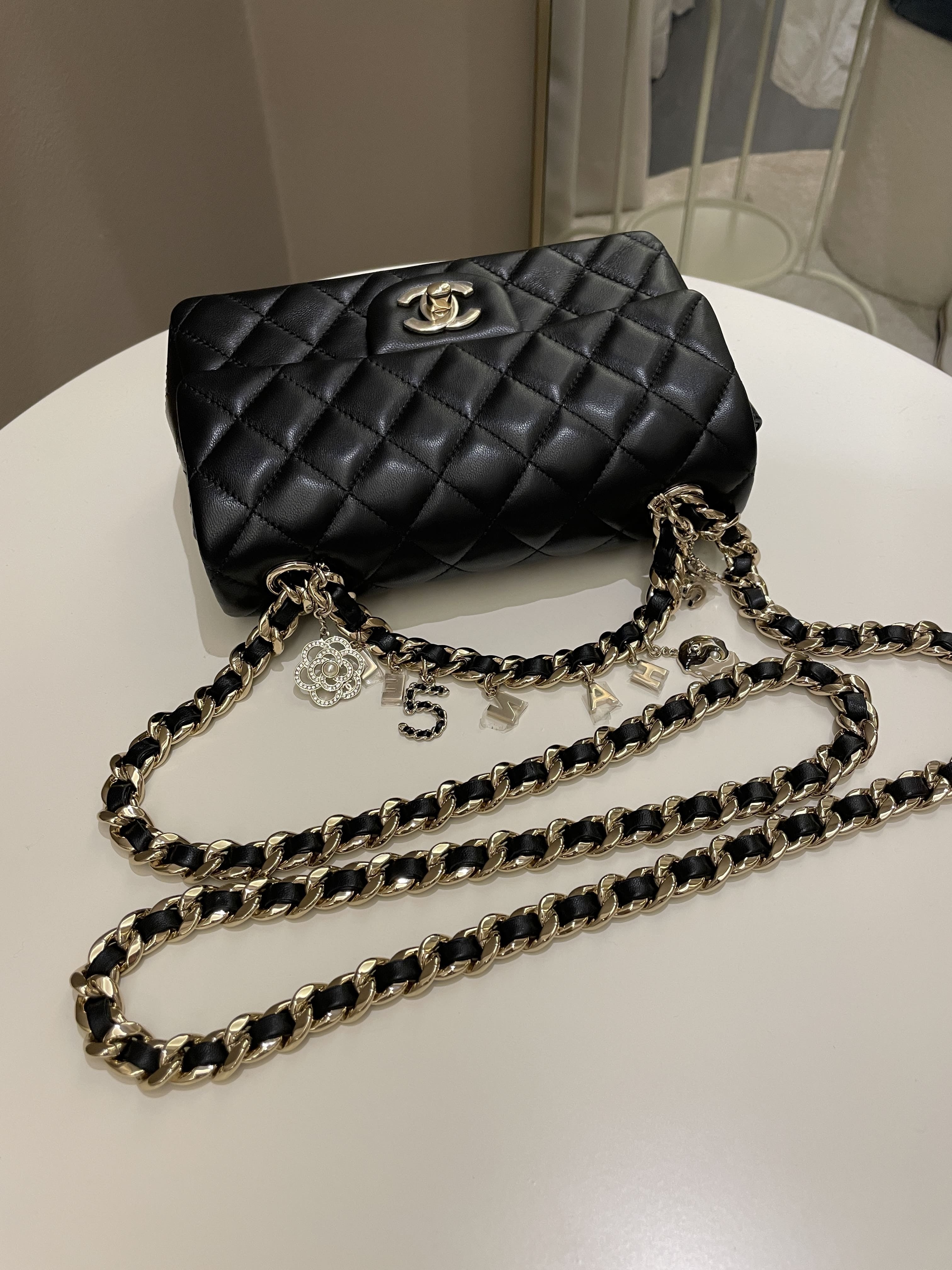 Chanel Quilted Mini Coco Charms Rectangular Flap Black Lambskin