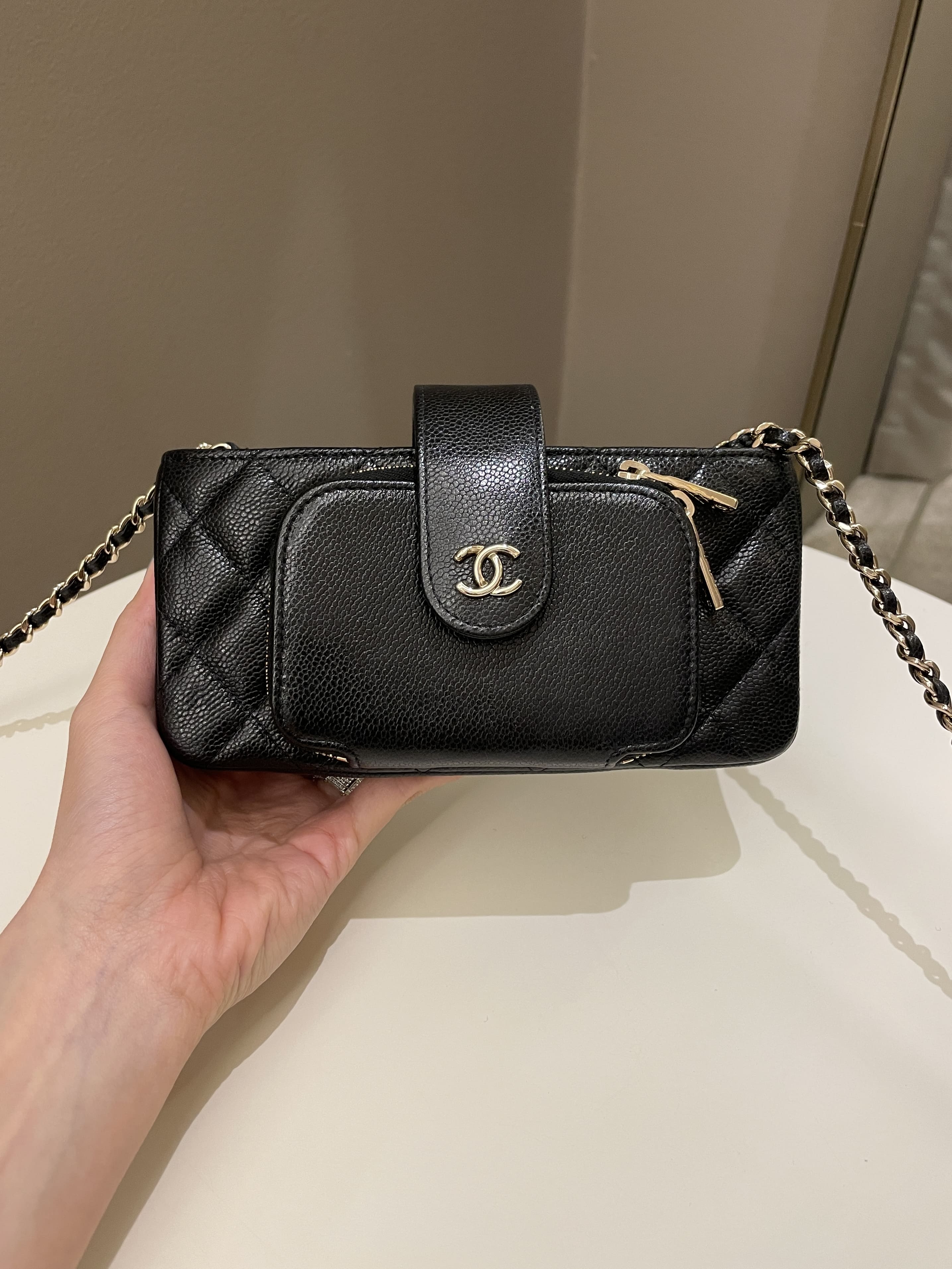 Chanel 22B Quilted Phone Holder With Chain Black Caviar