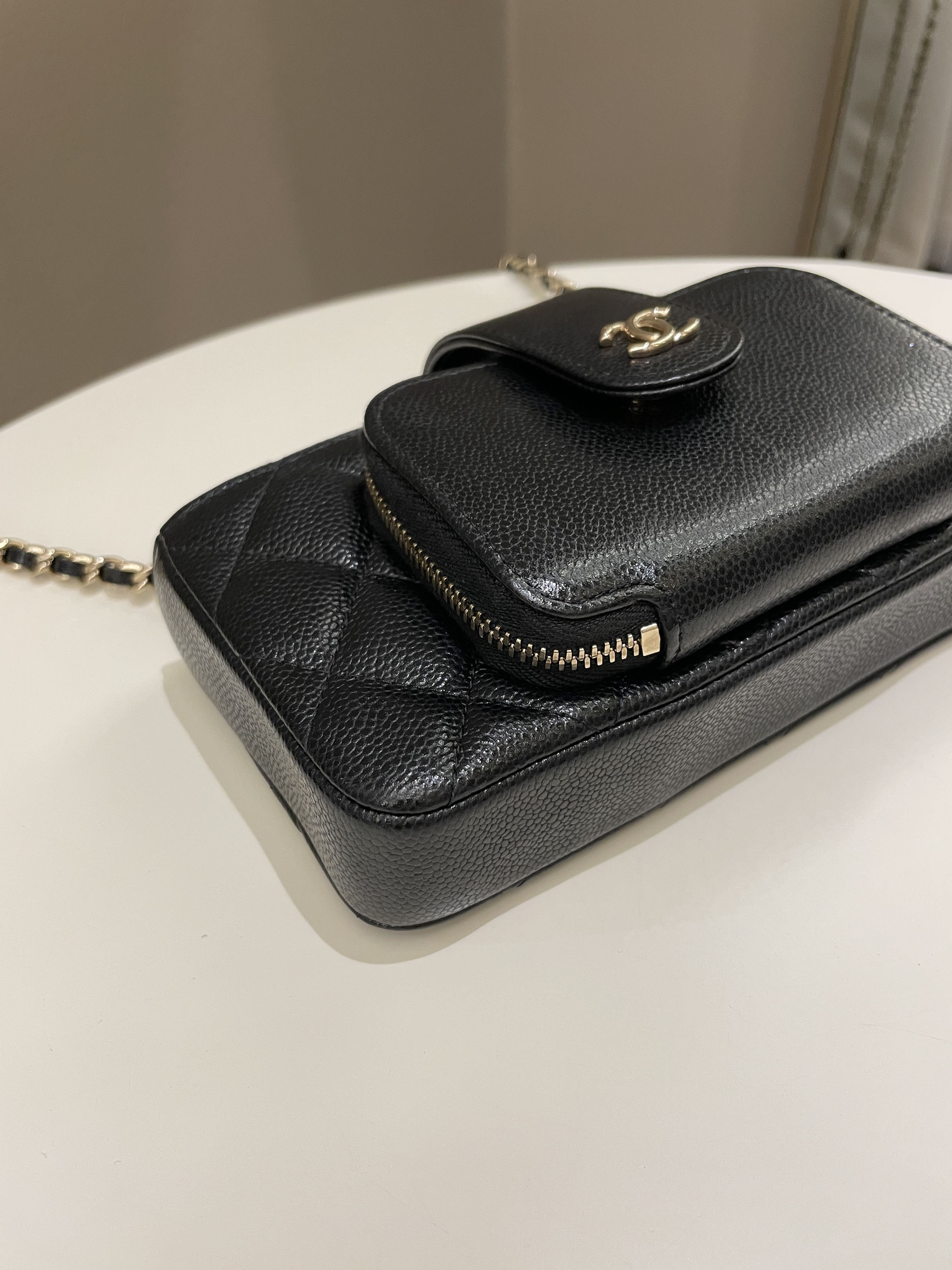 Chanel 22B Quilted Phone Holder With Chain Black Caviar