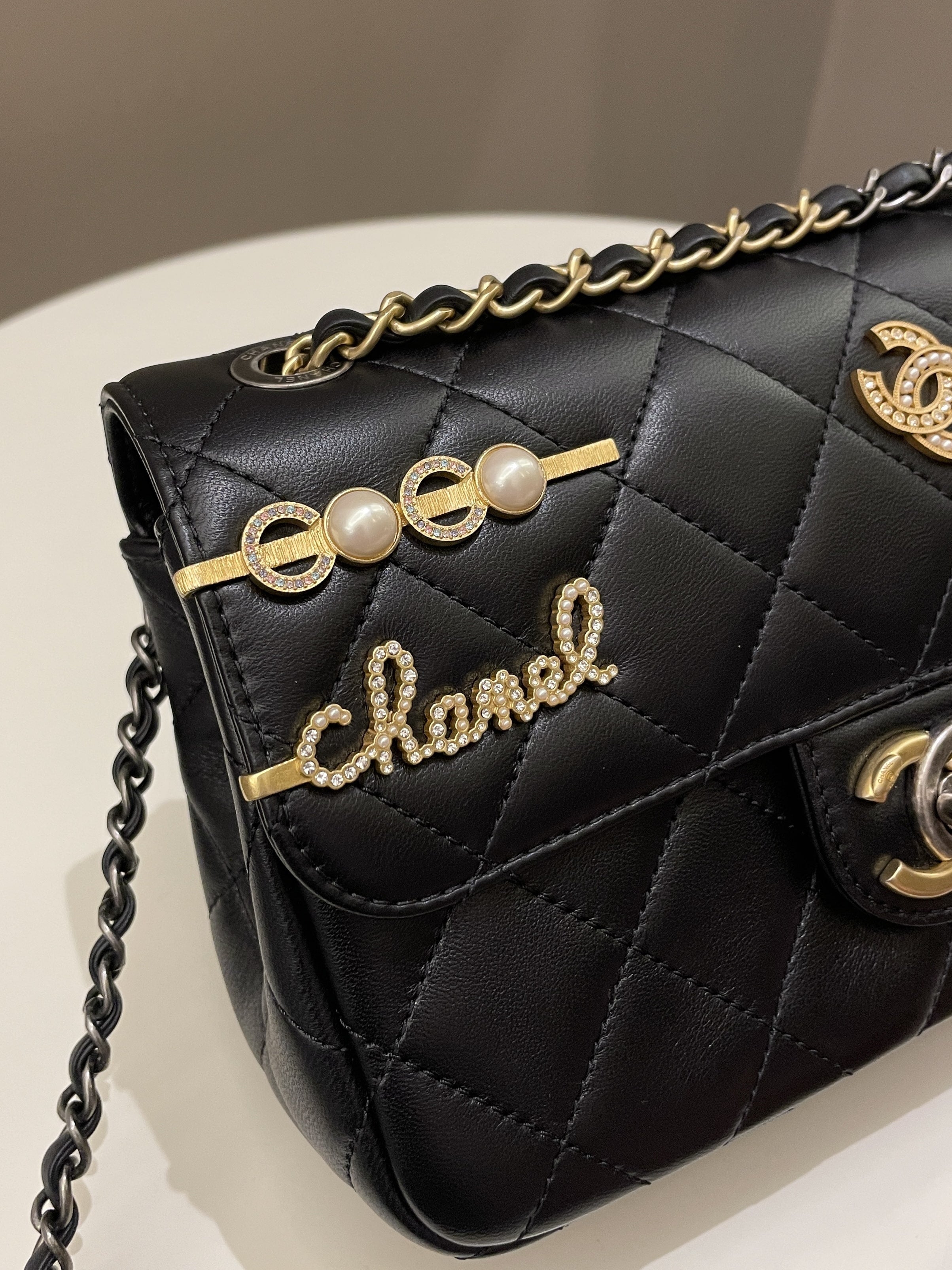 Chanel 22C Coco Pearl Signature Flap Black Lambskin