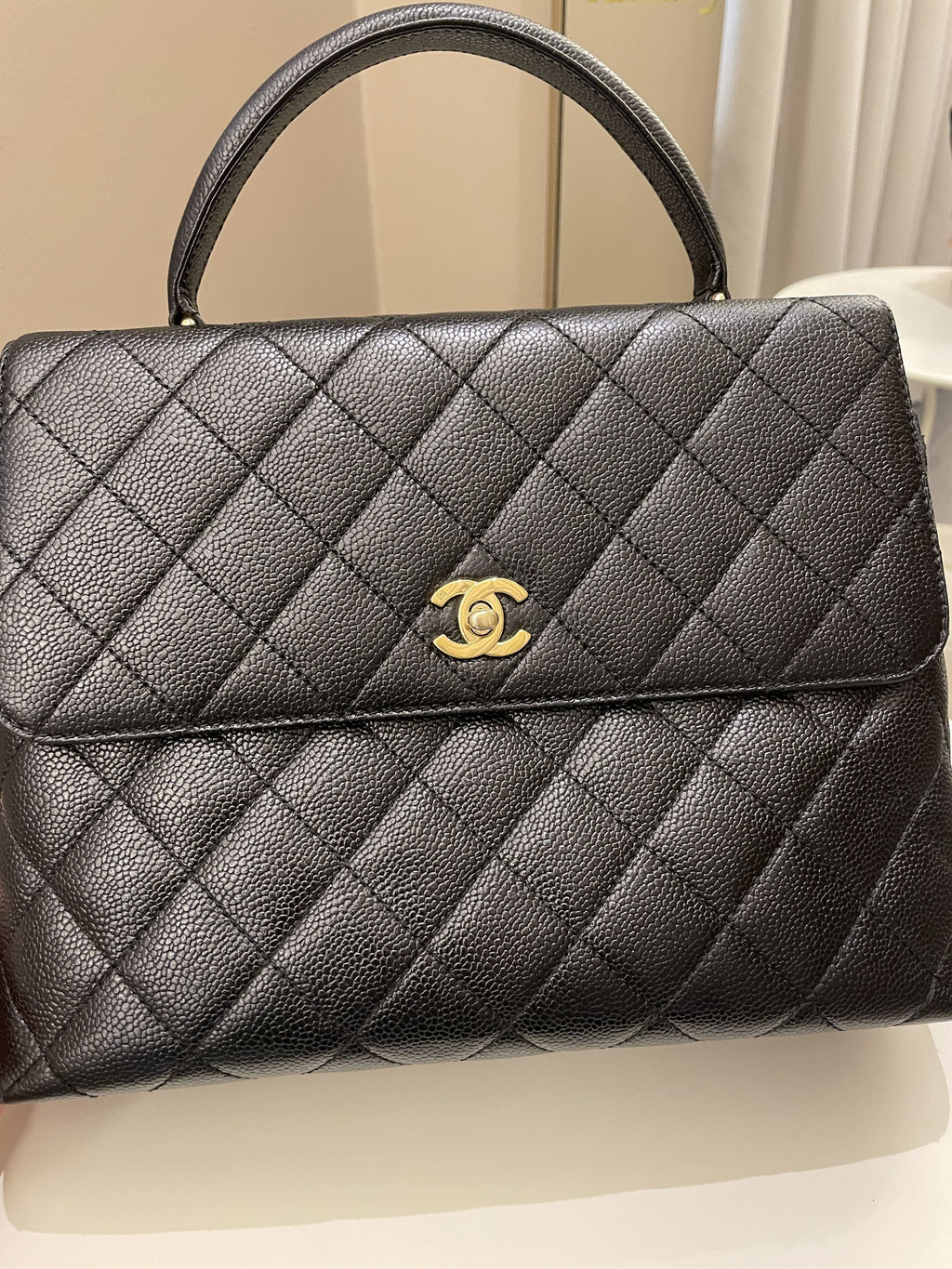 Chanel Kelly Quilted Top Handle Flap Black Caviar