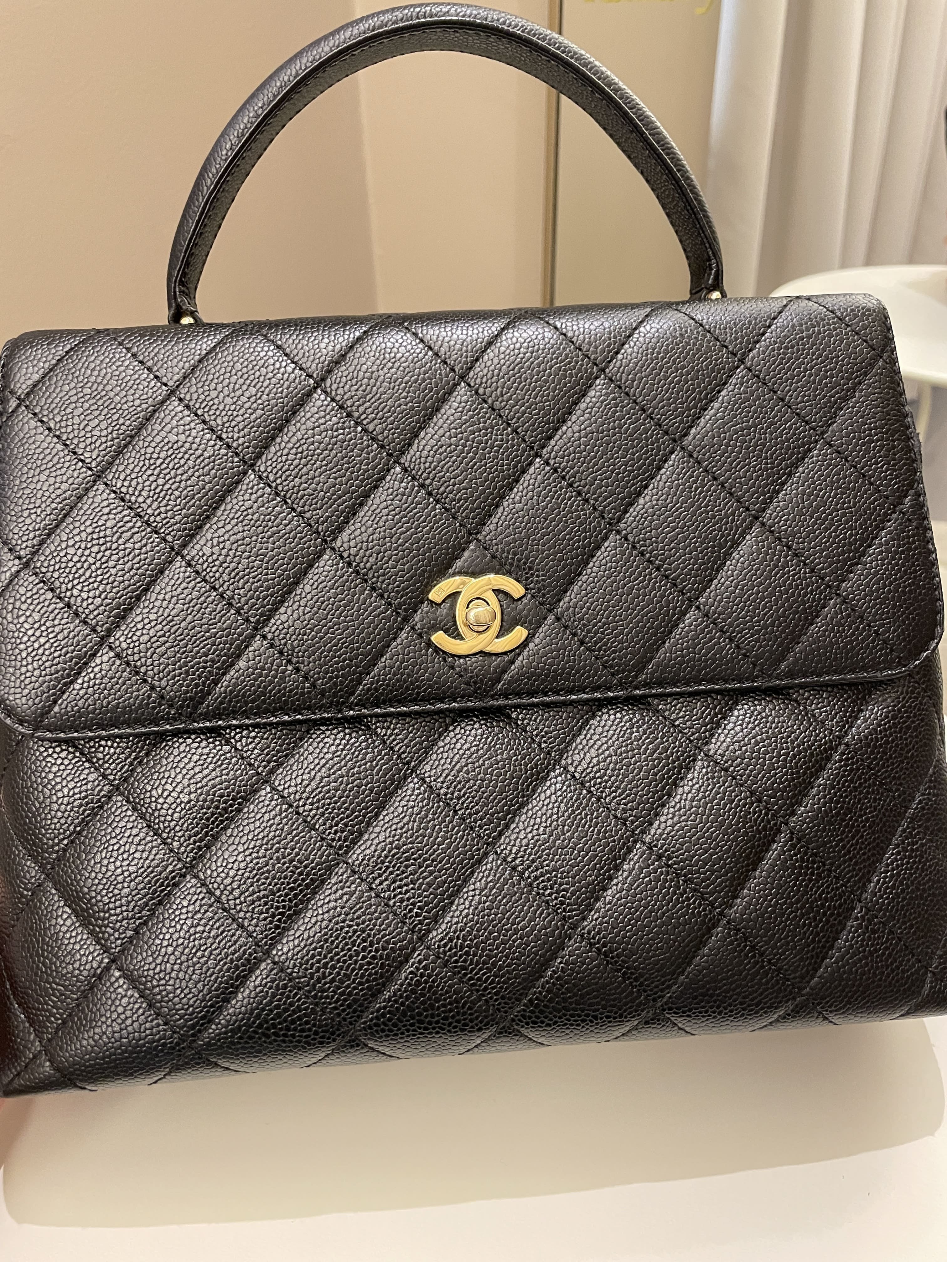 Chanel Kelly Quilted Top Handle Flap Black Caviar