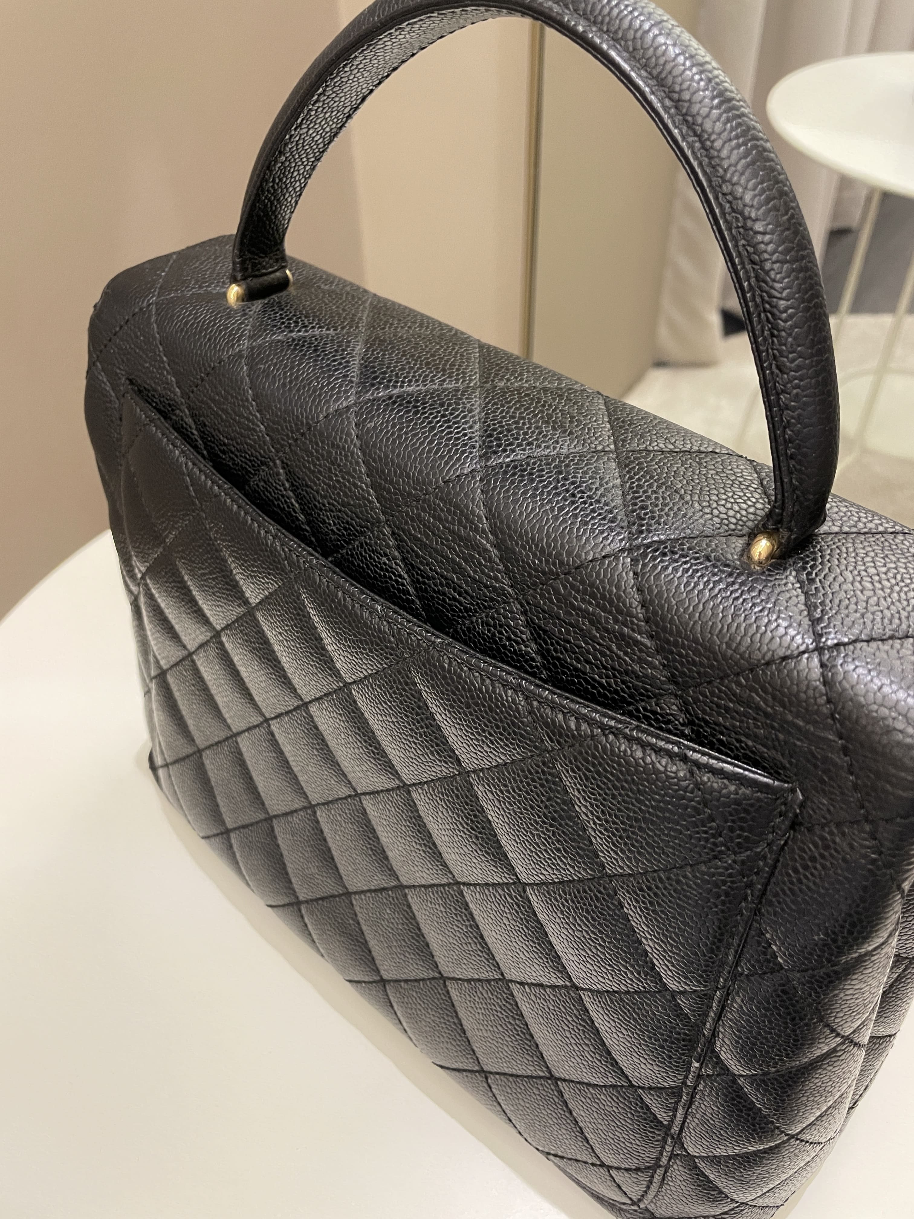 Chanel Kelly Quilted Top Handle Flap Black Caviar